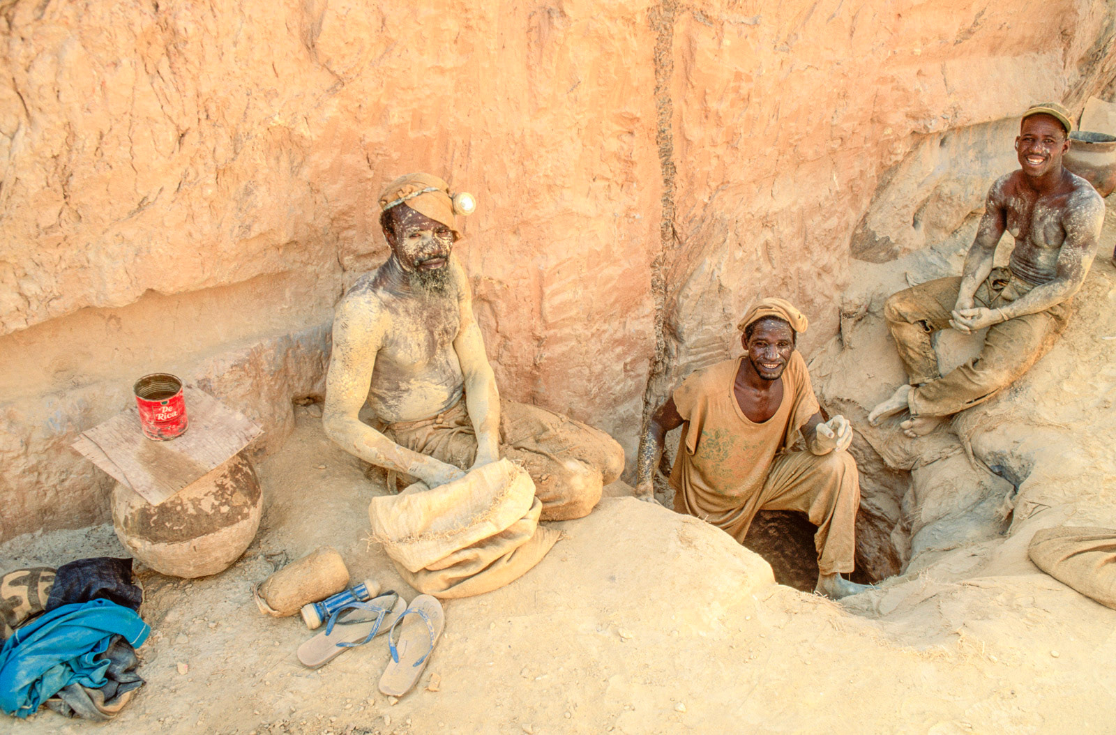 Miners working in a dangerous goldfield, Essakane, Burkina Faso