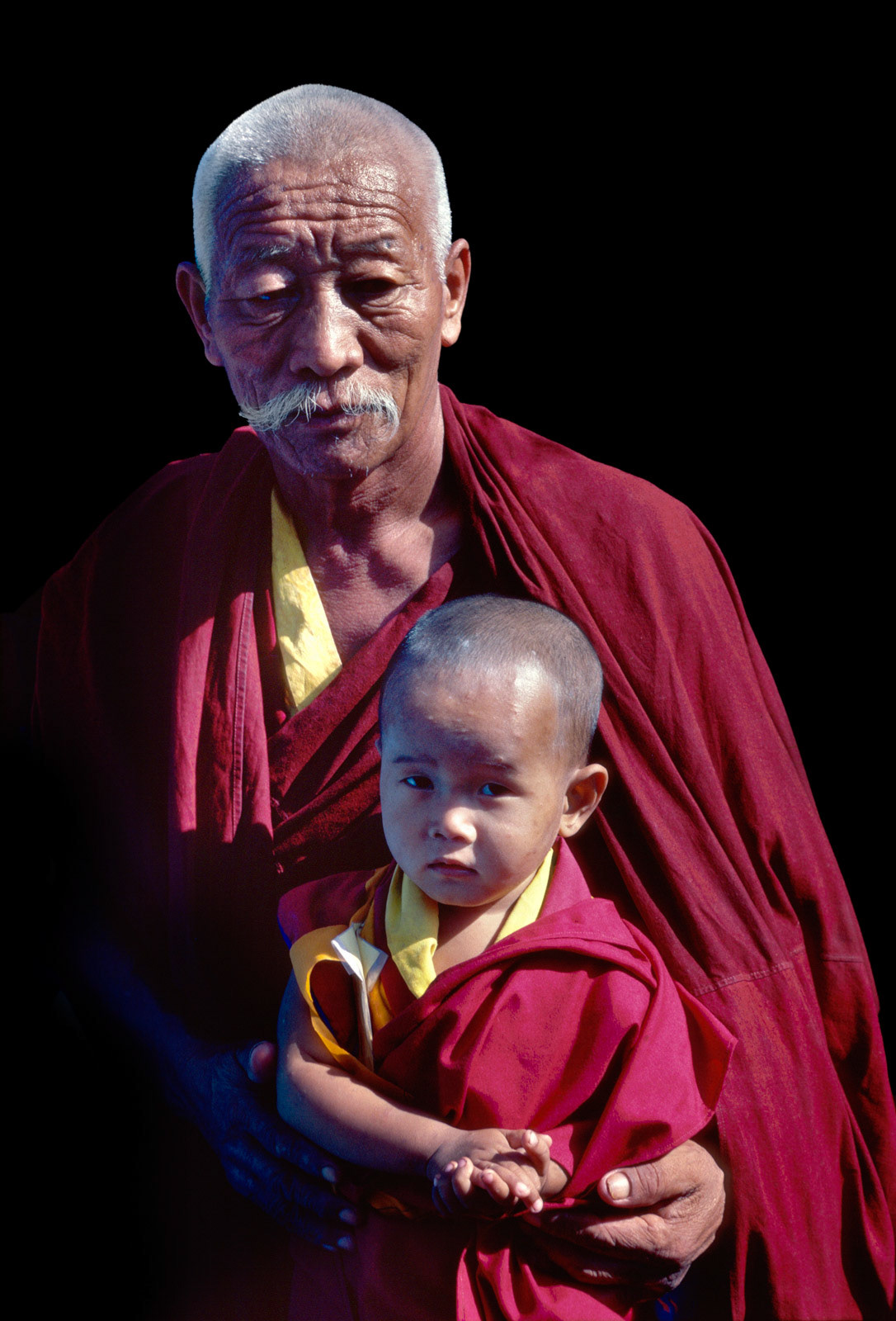 Tibetan Buddhist monk and boy monk student (chela). India