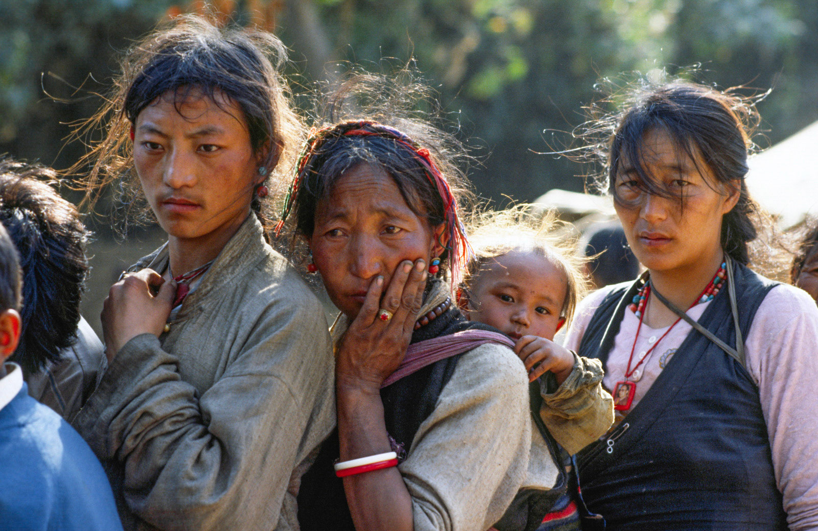 Tibetan pilgrims wait to receive blessings from the Dalai Lama. Bodh Gaya, India