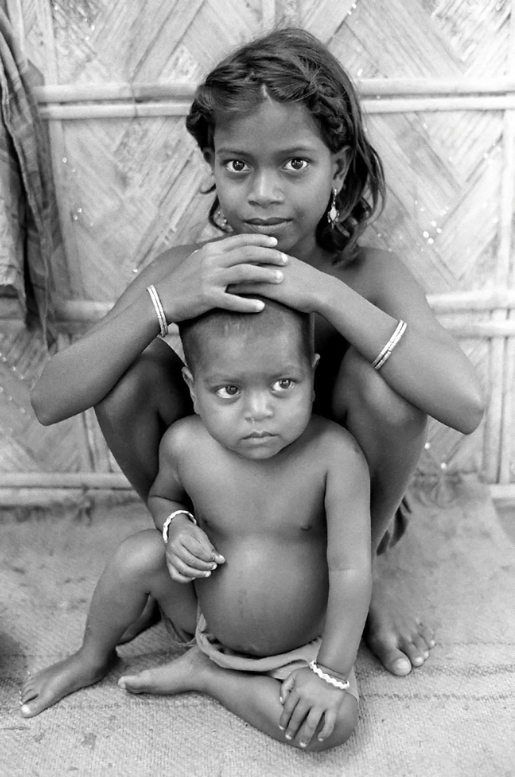 Rescued children cut off by flood. Khulna, Bangladesh