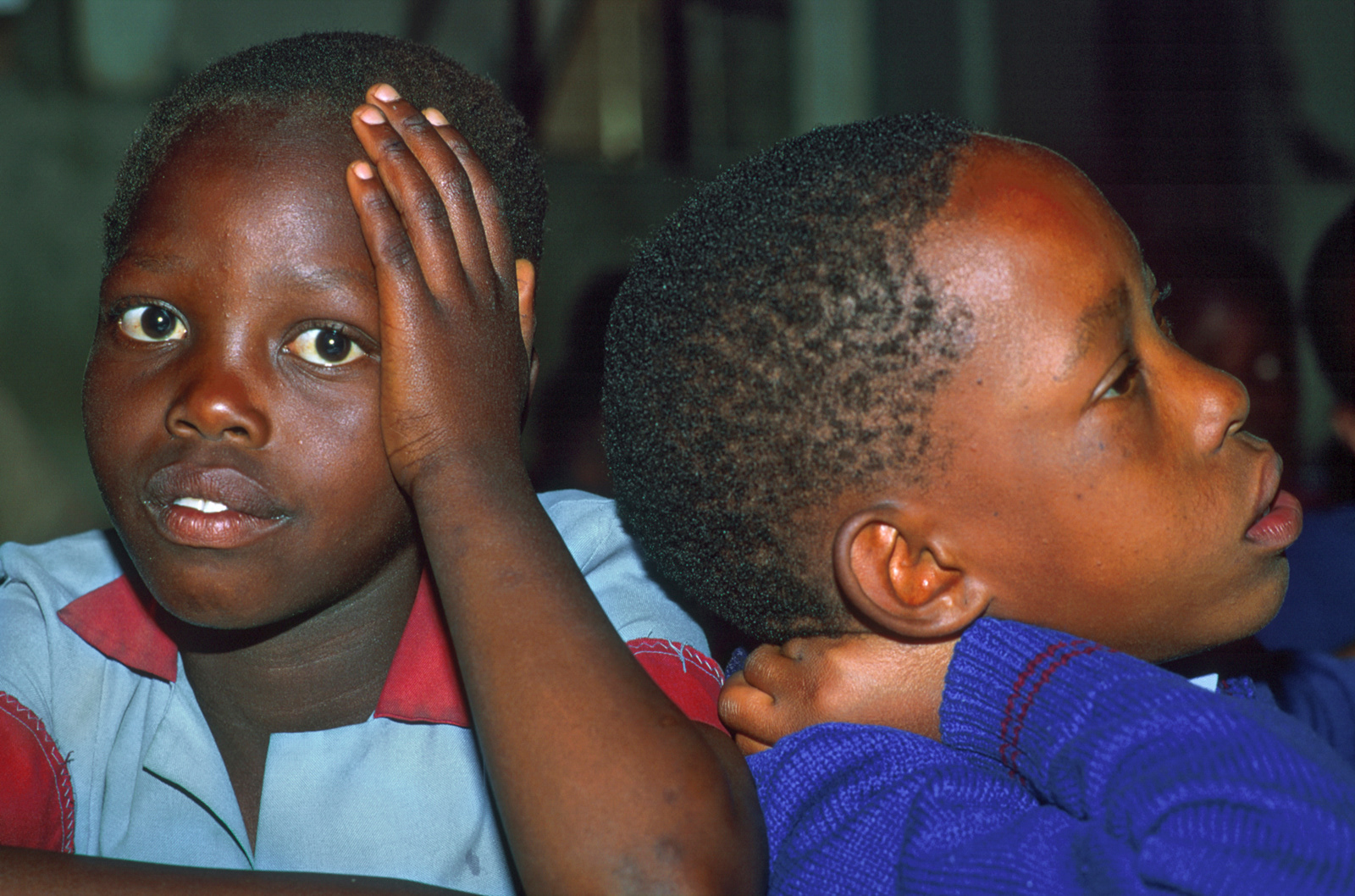 Two boys in a classroom. Quthing, Lesotho