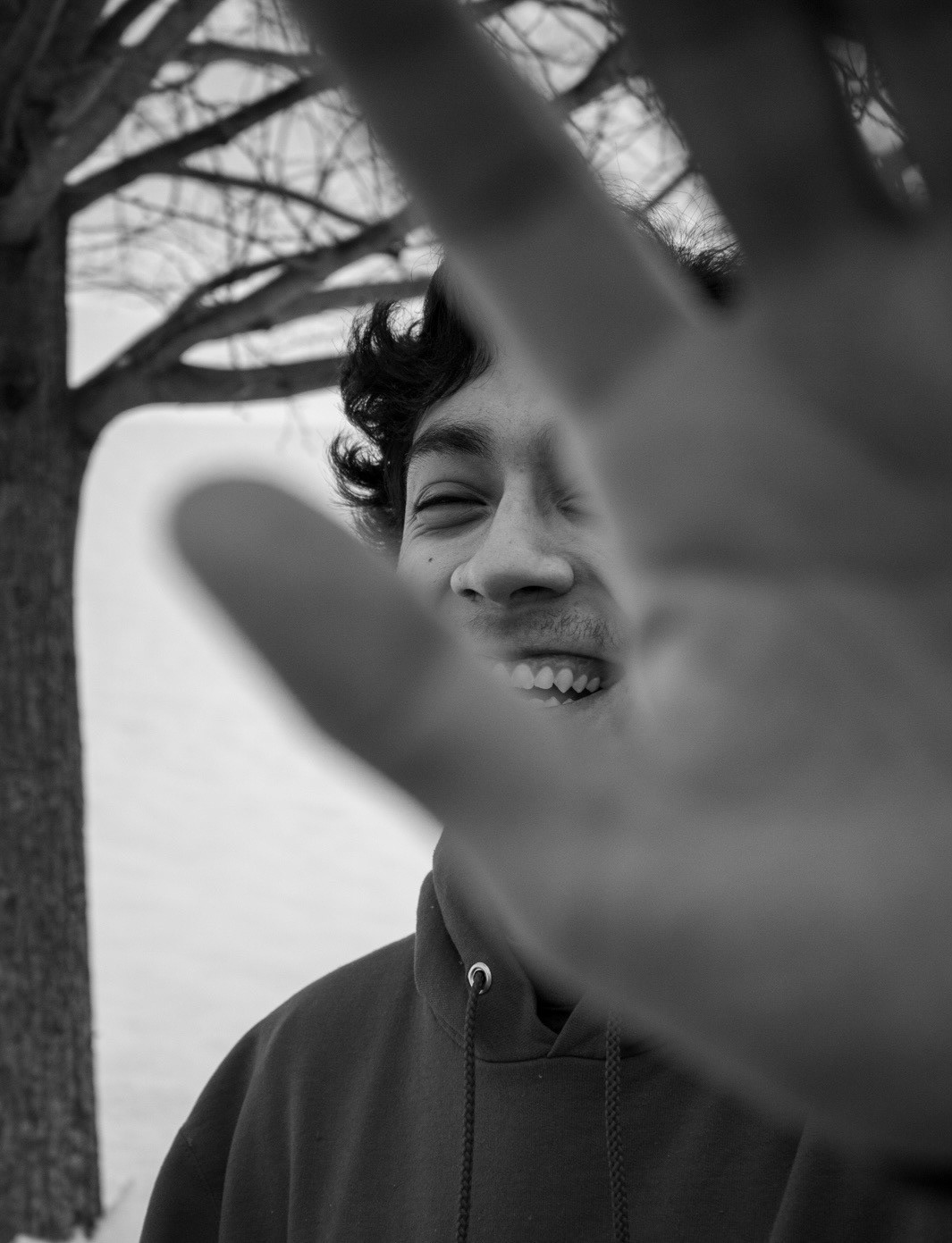Temple alumnus Kevin Navarro-Perez poses for a portrait outside of Tohickon Middle School in Doylestown on Feb. 9, 2021. 