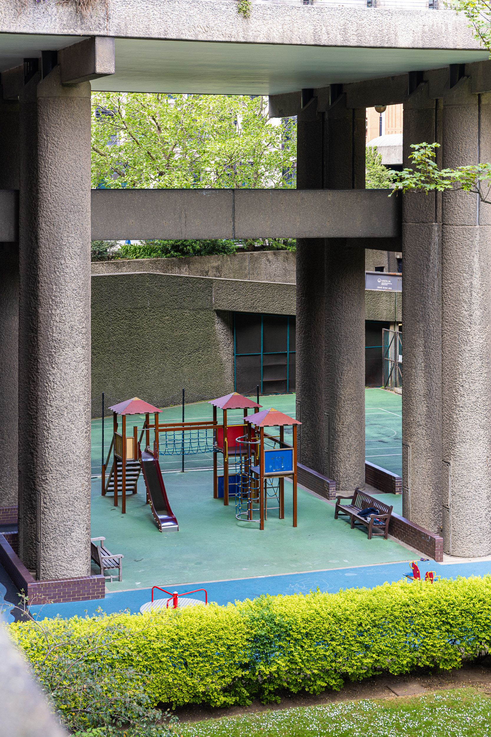 Playground in the Concrete. There was something incongruous about a children's playground hidden in the midst of a sprawling concrete expanse. Barbican, London.