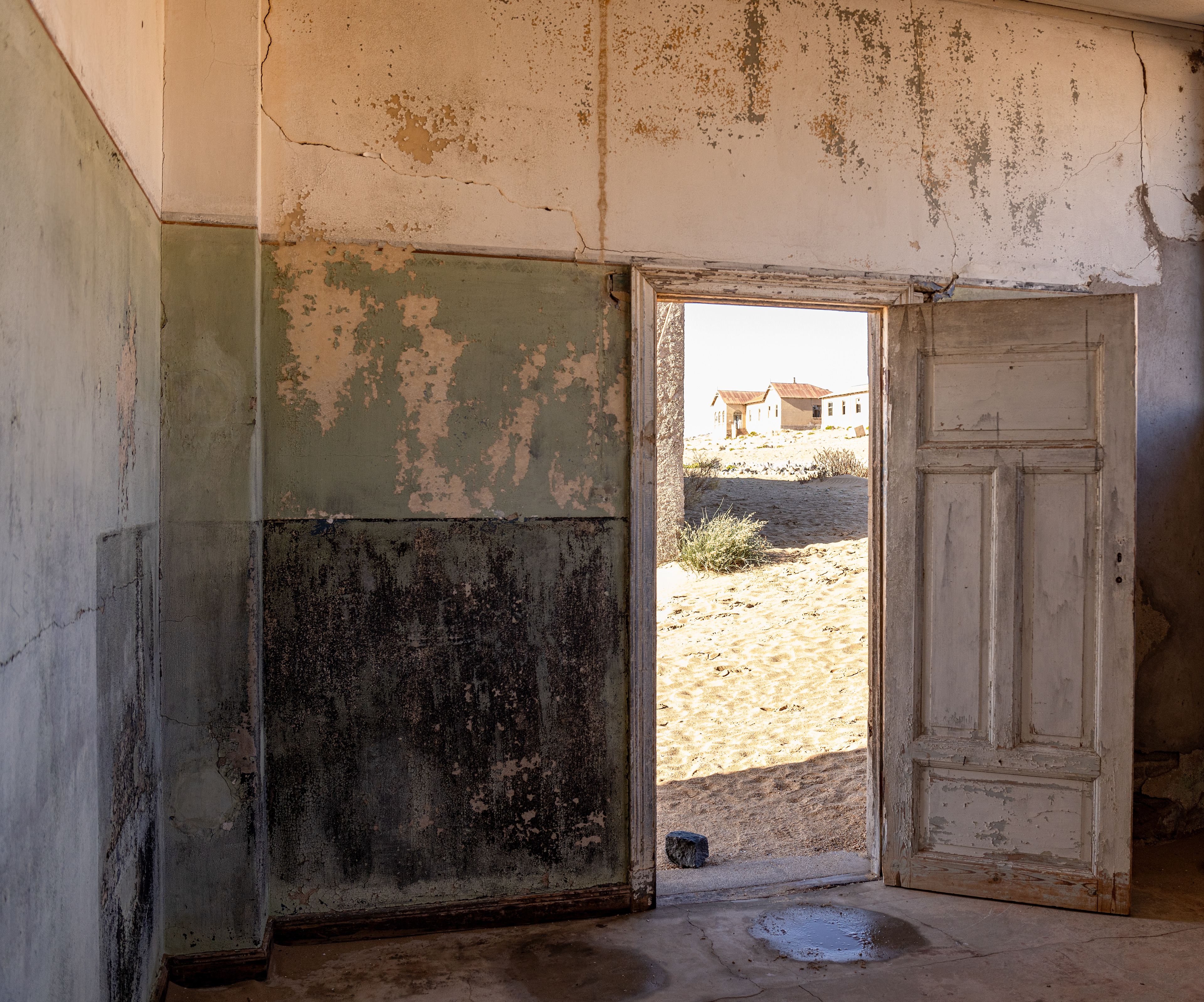 Kolmanskop I - Kolmanskop town sprang up after a railway worker discovered a sparkling stone in the sand, which proved to be a diamond. Kolmanskop, Namibia.