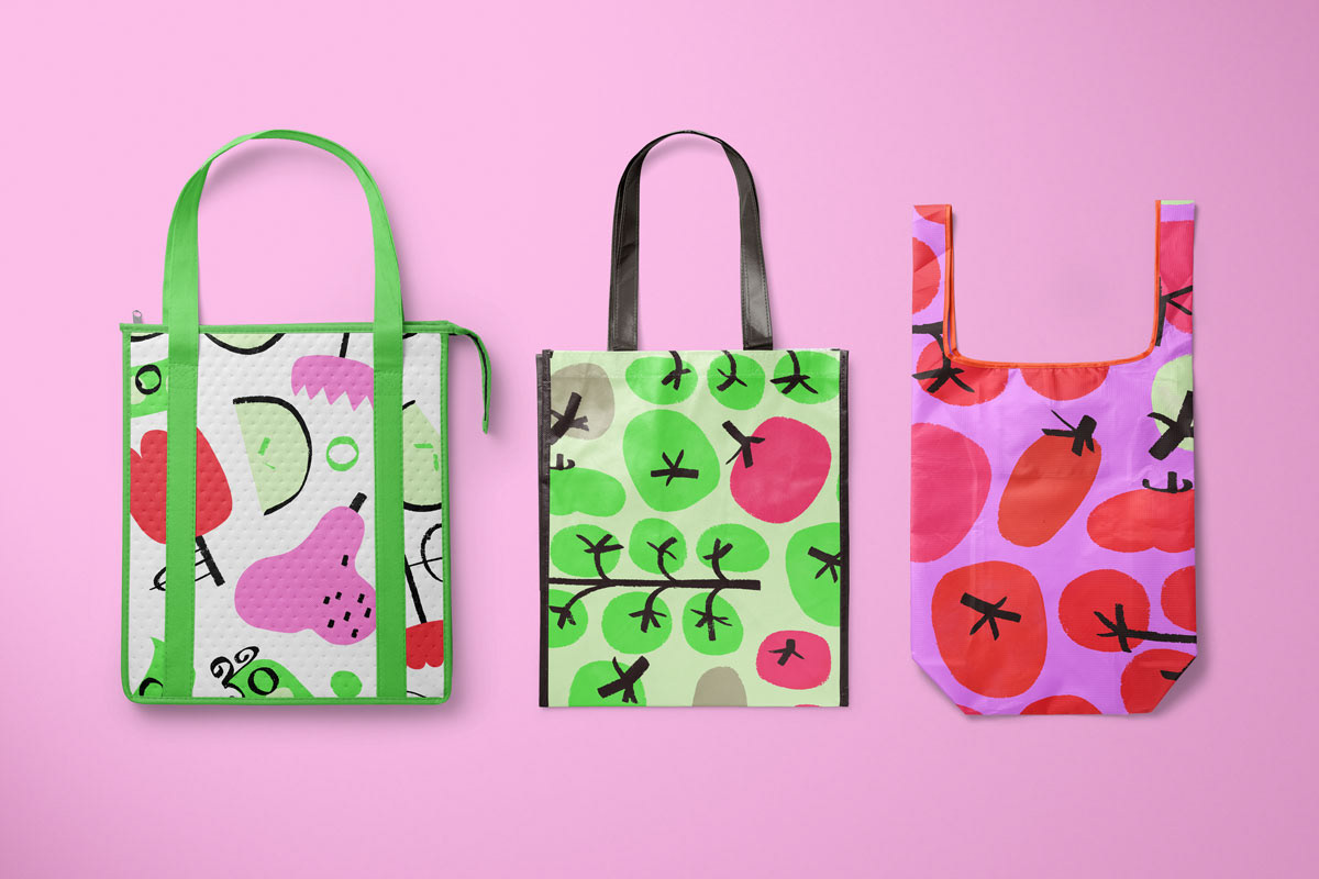 Shopping bags with bold food graphic pattern designs with a pink background. Surface design collection.