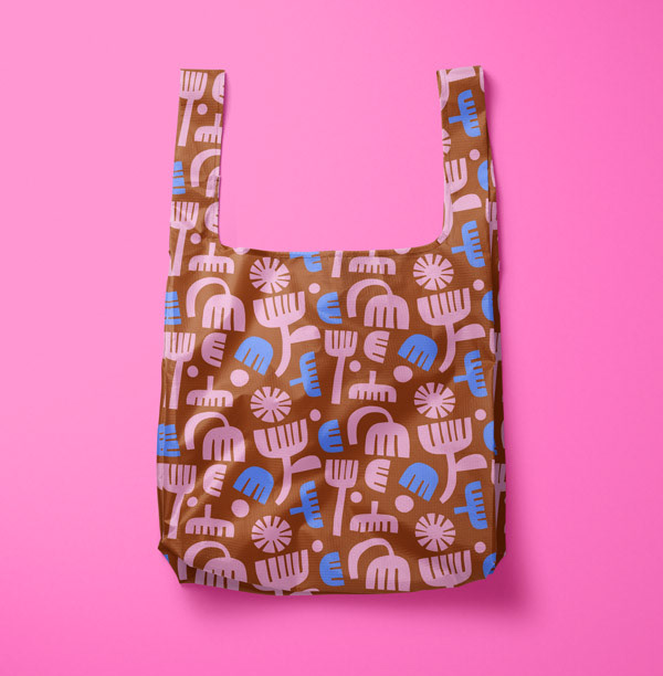 Reusable bag with a geometric flower pattern by Cris Tamay
