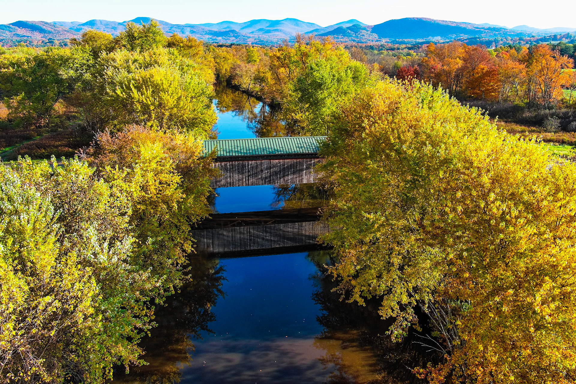 "Otter Creek Crossing" --Pittsford