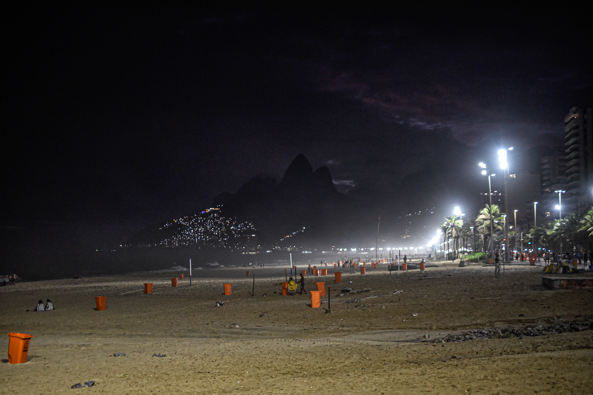 Ipanema at night, favela in the distance