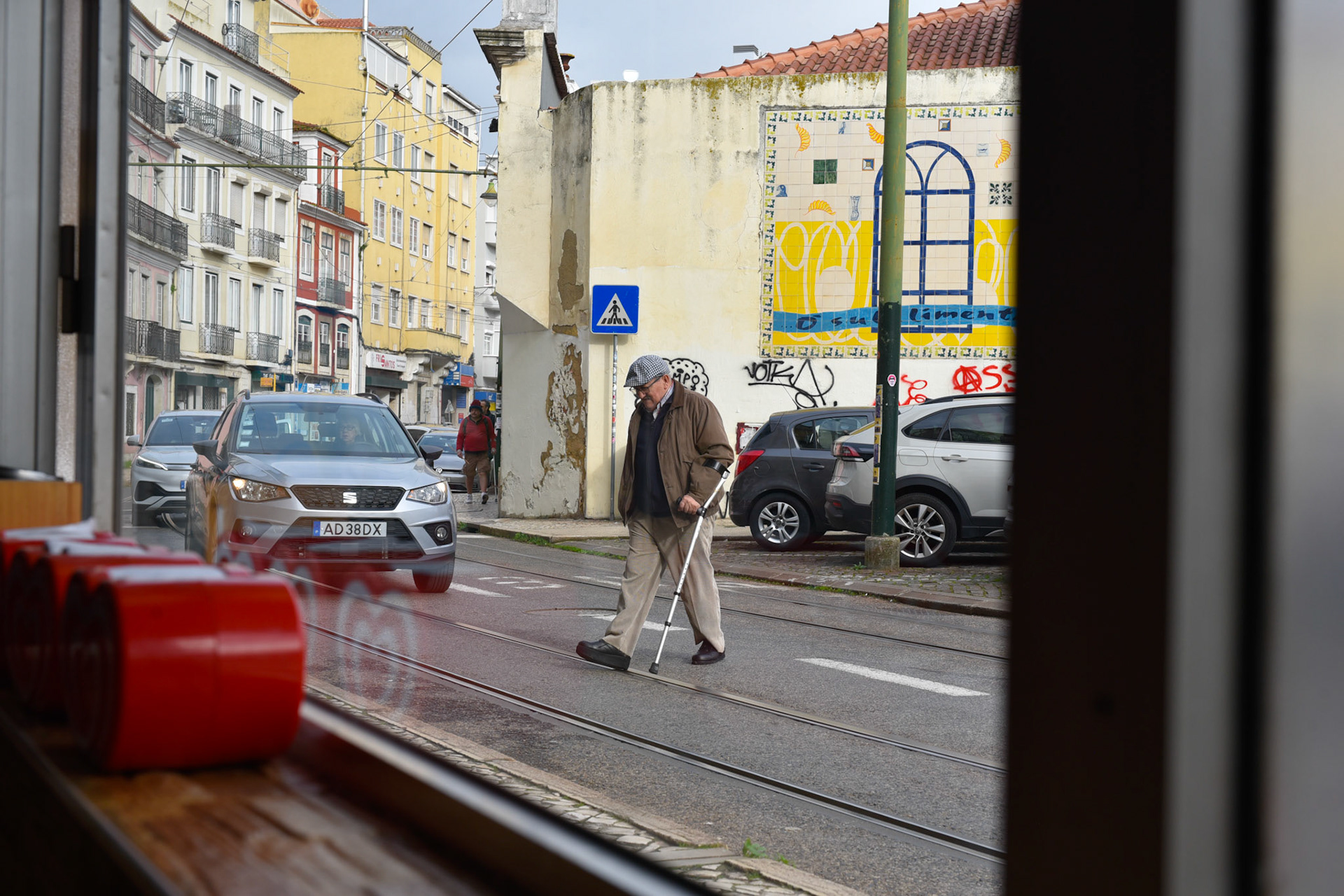 man crossing street