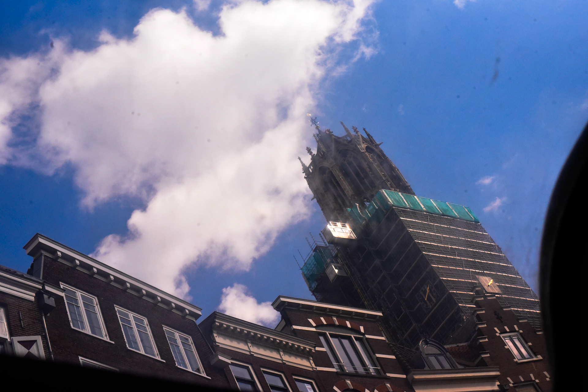 documenting blue sky from the canal cruise boat and the Dom tower of Utrecht