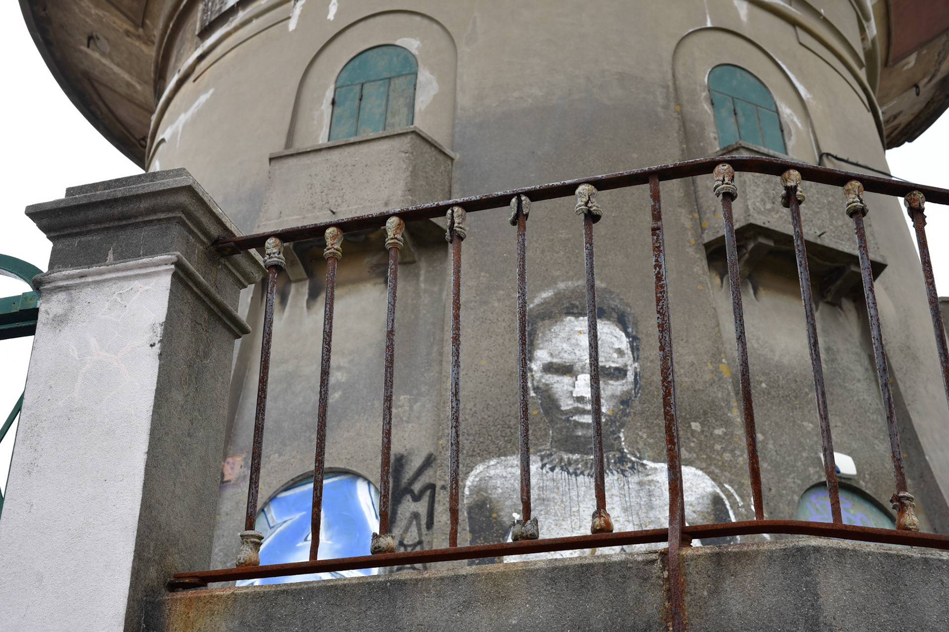 water tower with portrait