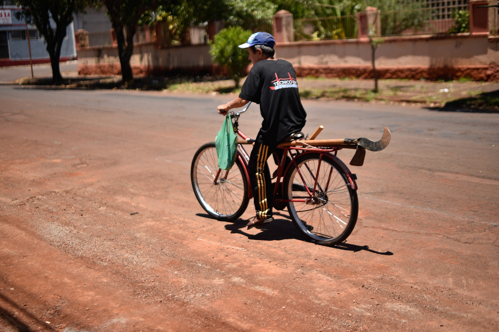Biking with a scythe