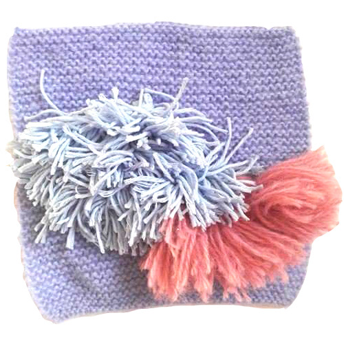 hand knitting and tassels