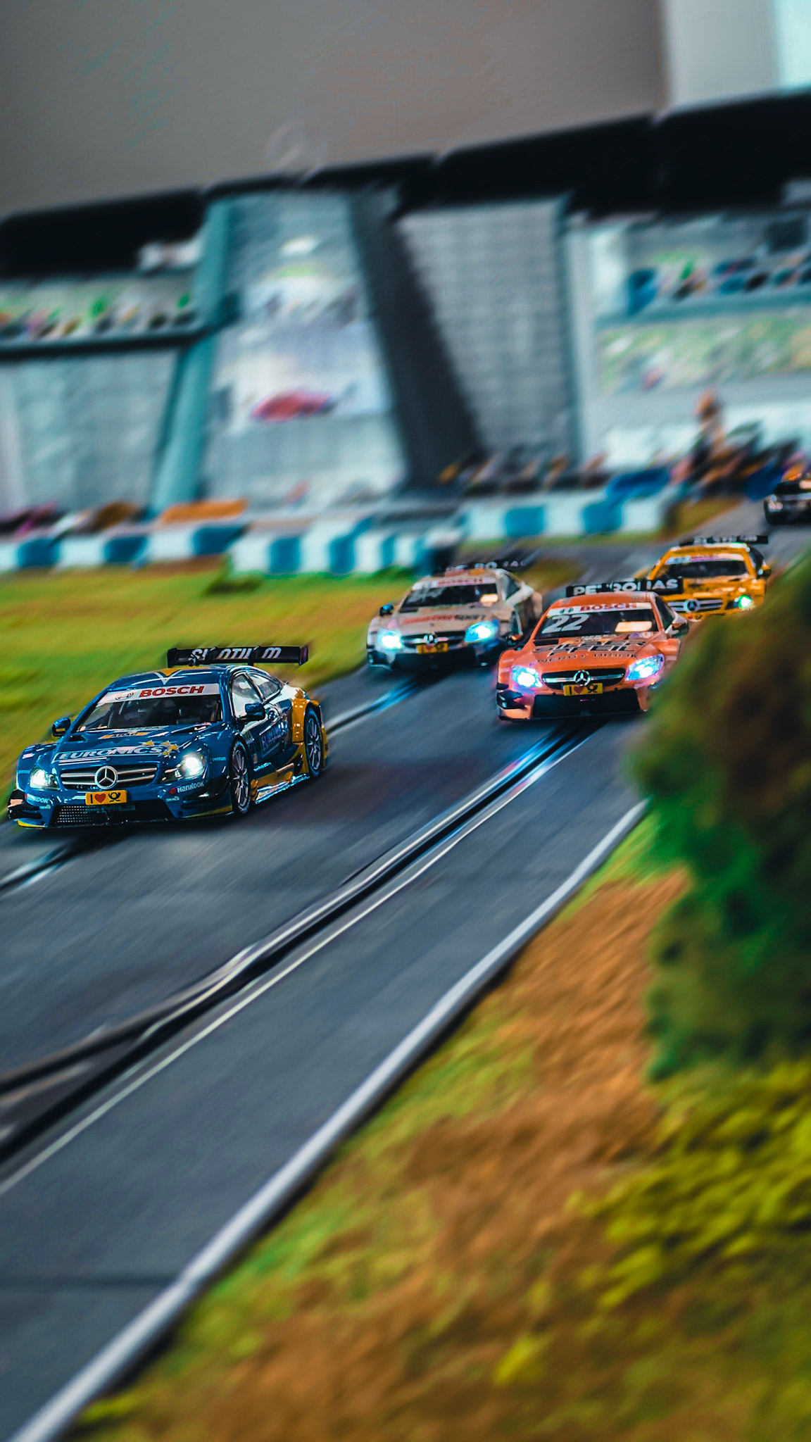 Slot-car showdown – six Mercedes DTM titans, one narrow line, and zero room for error.