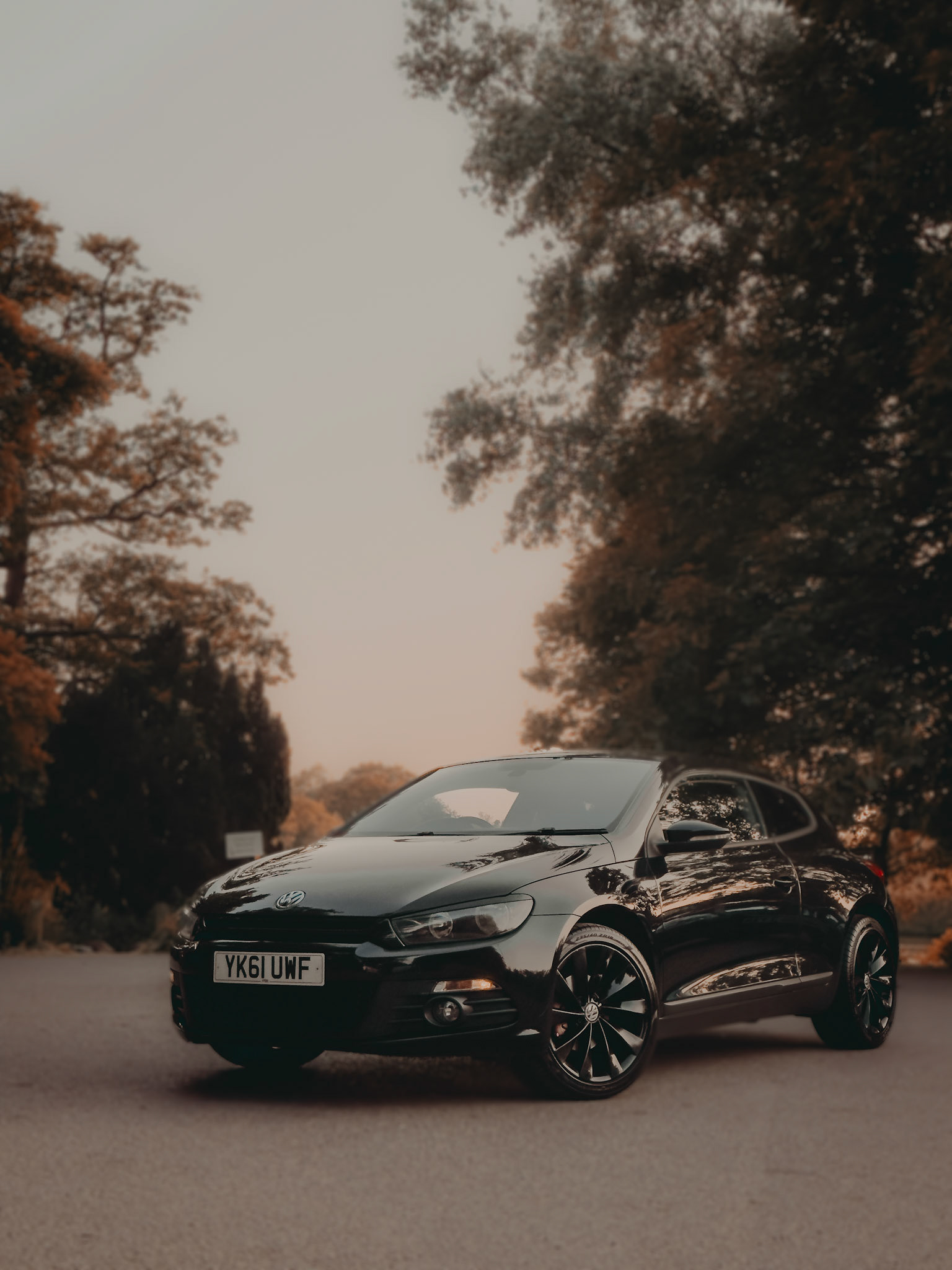 Golden hour gloss – the Scirocco soaking up the silence before the drive.