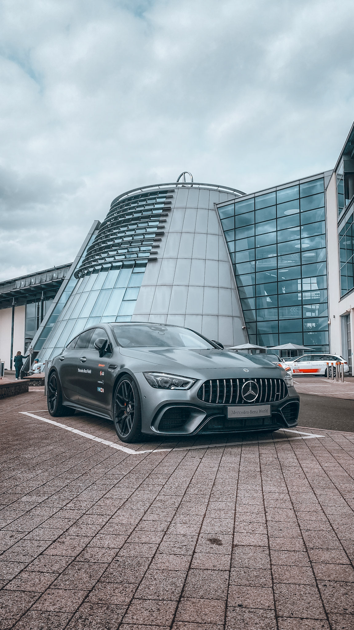 Power meets precision – the AMG GT 63 Coupé parked proudly beneath the iconic Mercedes-Benz World atrium