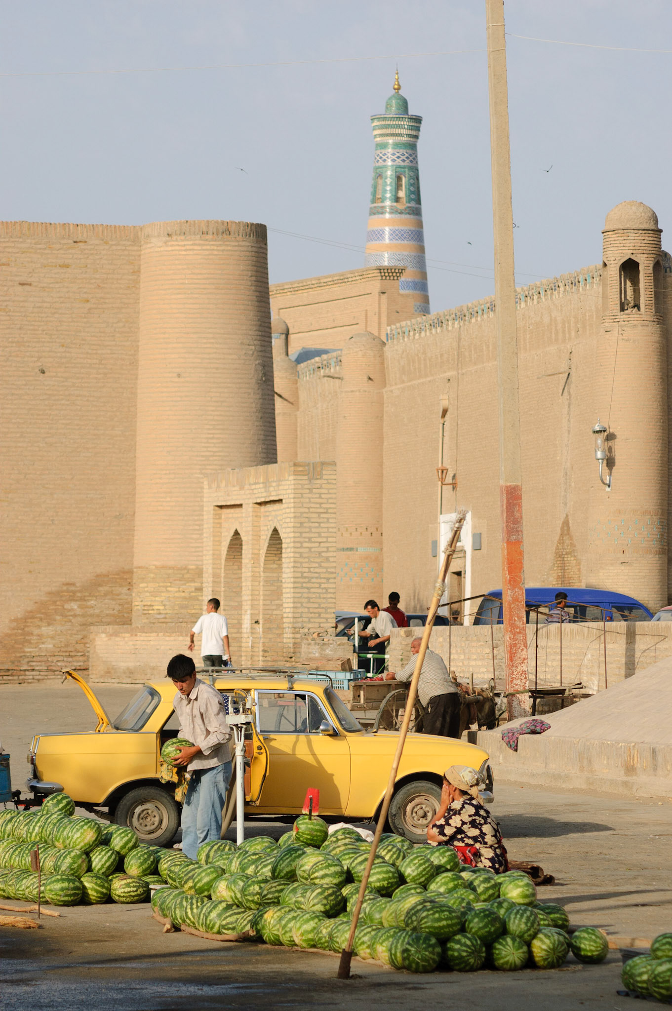 watermelon sellers in front of old city walls, Khiva
