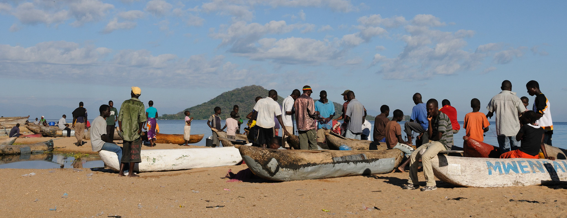 Fishermen with dug out canoes, Lake Malawi