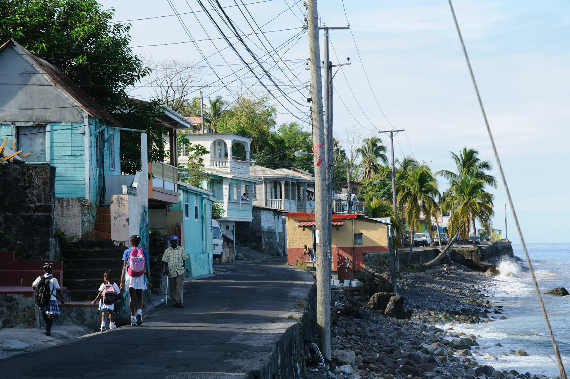 Narrow coastal road through Loubiere village