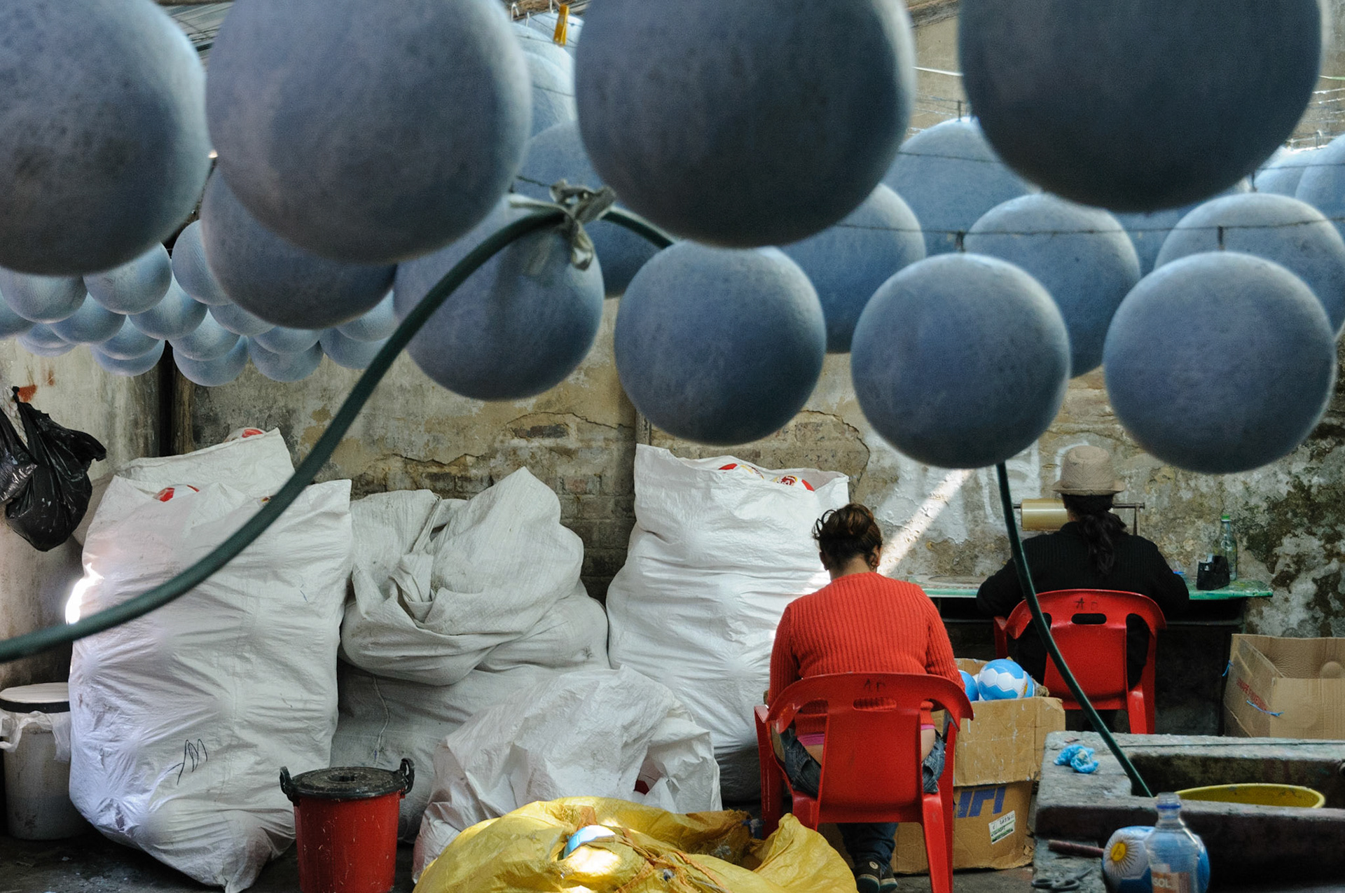 Small football factory, in mountain village of Mongui