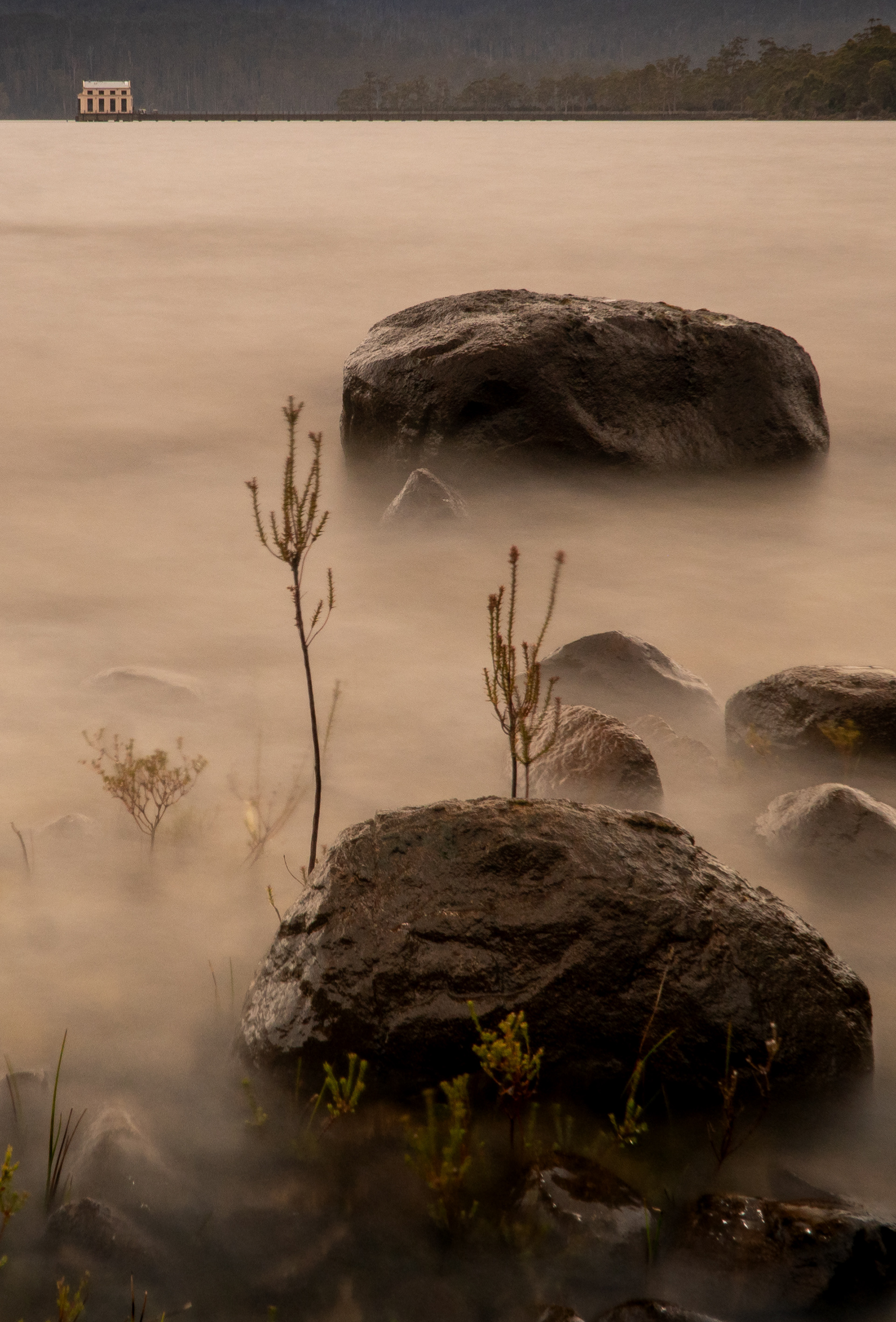 Pump House with some rocks and long exposure