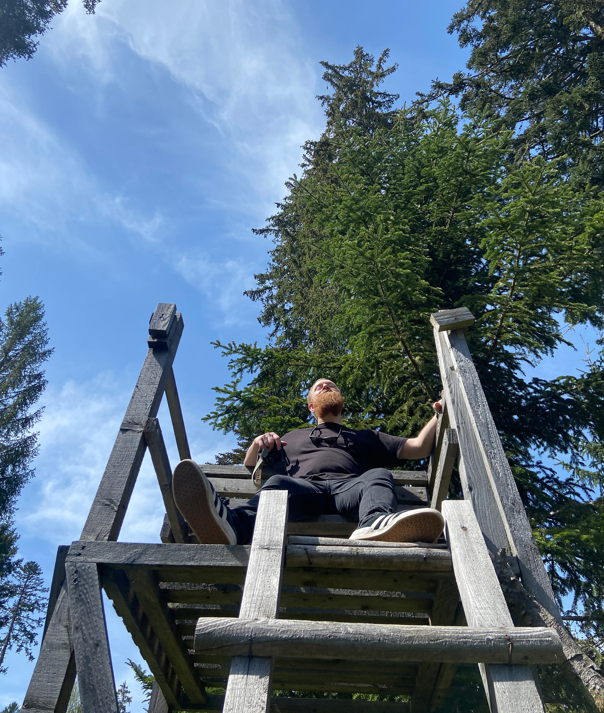 Inspecting a hunters tower in the forest