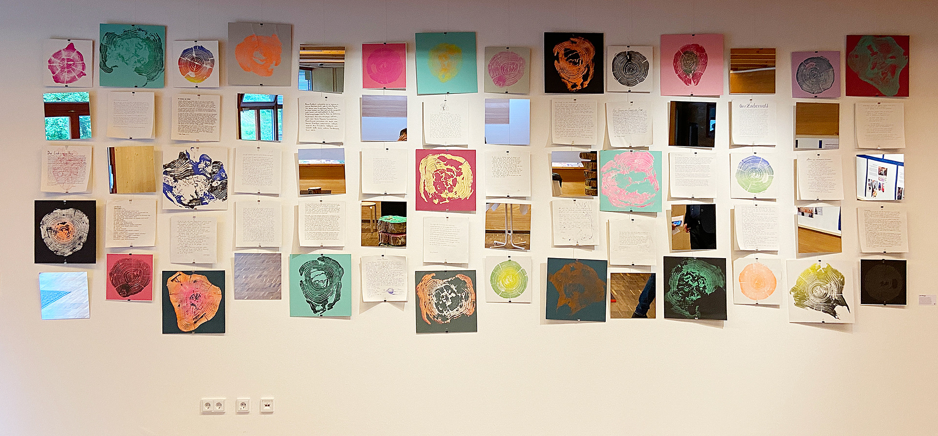 These are life stories written down by the German pupils, with mirrors and prints of the tree stems. The trees are also telling their stories.