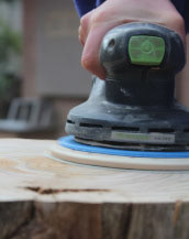 Sanding down the wood