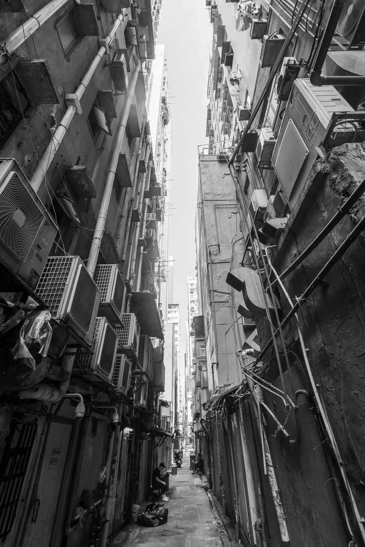 Back alley in Yau Ma Tei, Hong Kong during the day (black and white photography)