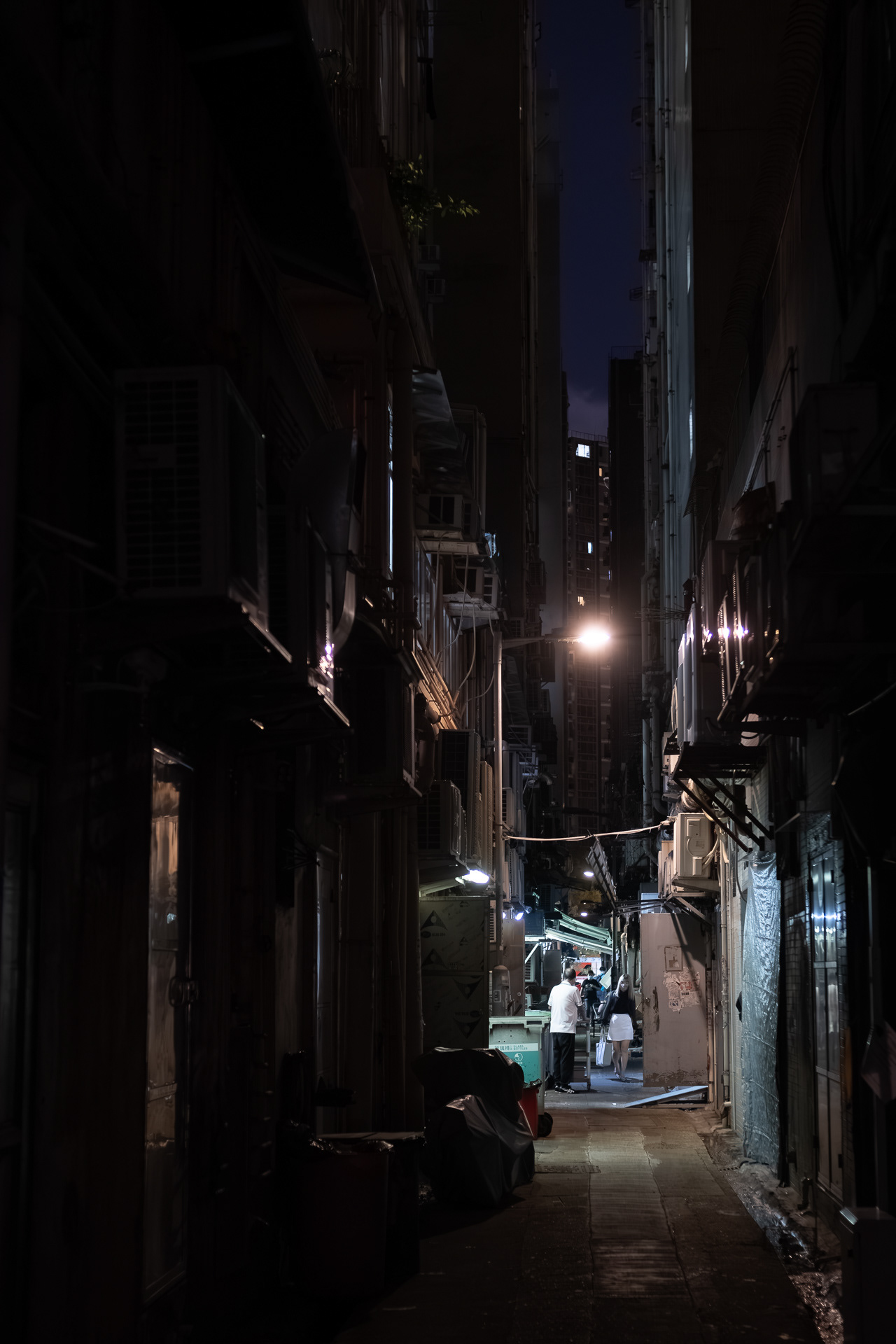 Hong Kong Night Alley with worker