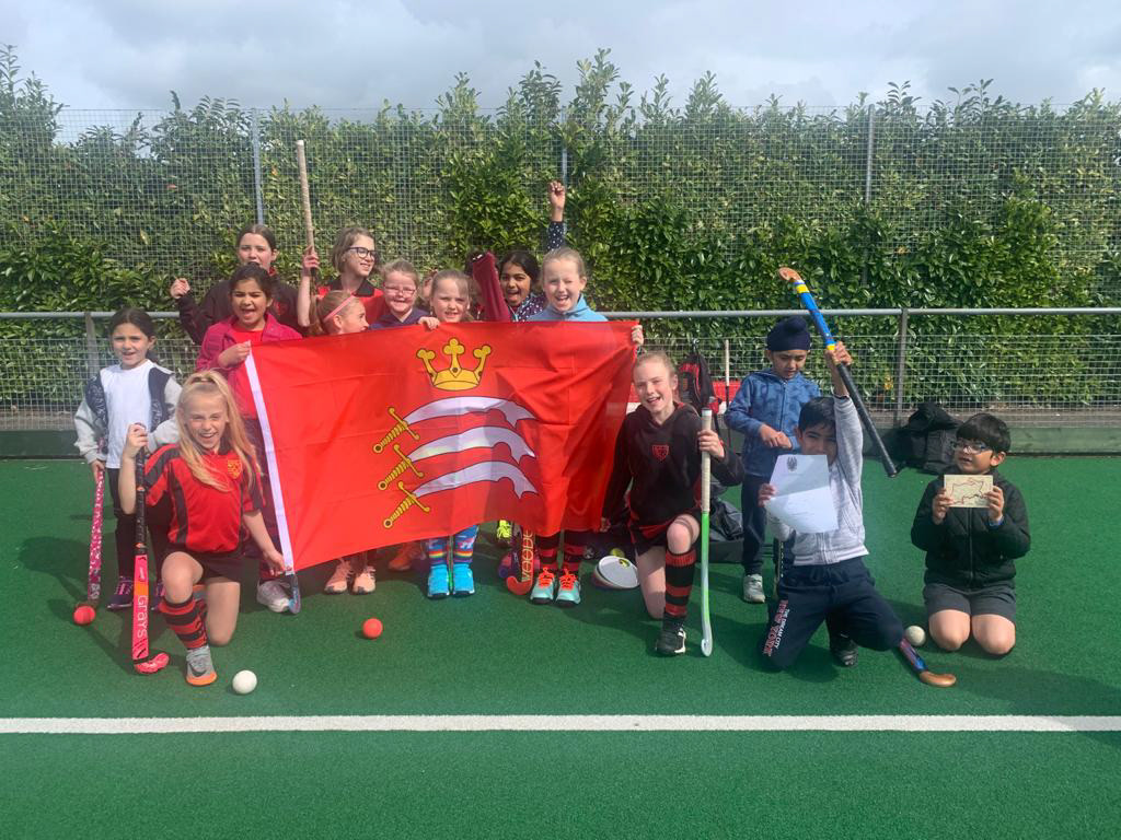U10-12s with the Middlesex Flag