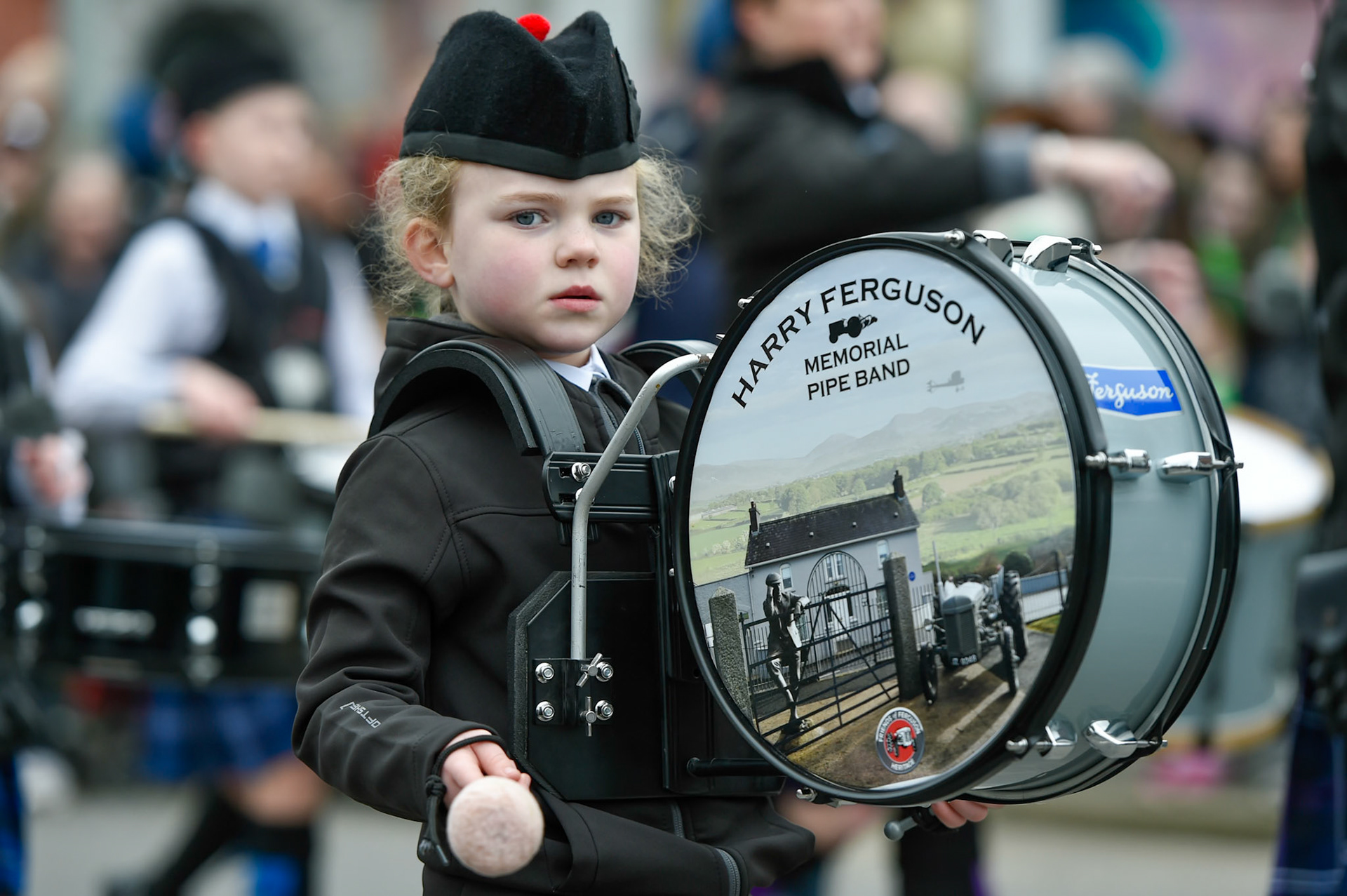 17-03-2025, Downpatrick, Co Down.St Patrick's Day Parade and Festival.Little Drummer girl from Harry Ferguson Memorial Pipe Band Departed Downshire Estate and followed the Ardglass Road into the town centre (Rathkeltair Car Park, Lower Market Street).