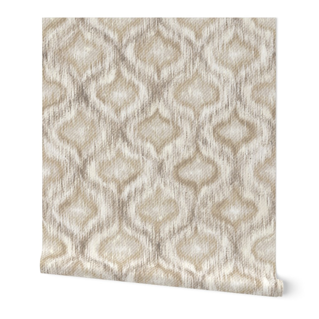 Flat pattern swatch of boho ikat ogee wallpaper in warm cream and sand, with subtle tonal contrast and organic ikat texture throughout the repeat