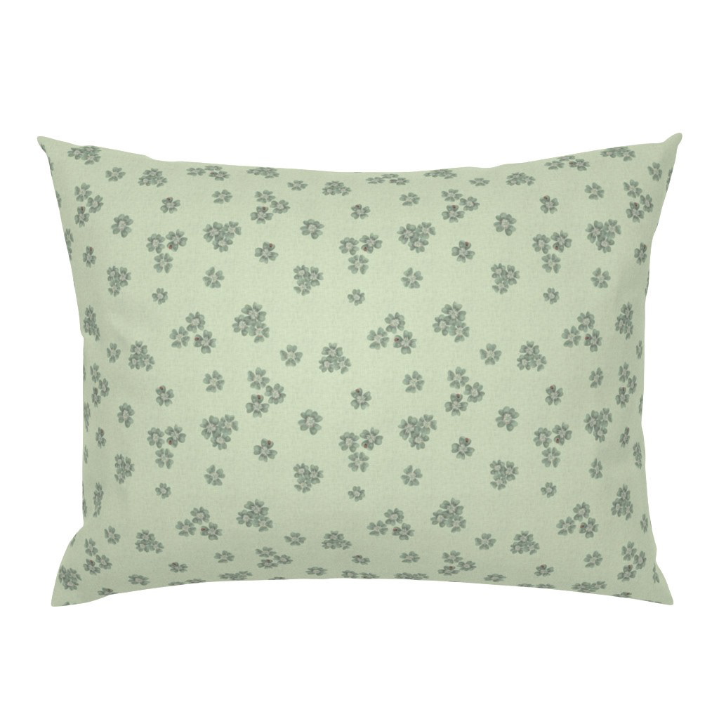 Pillowcase in Clover Scatter sage green colourway with tonal clover scatter pattern, on a white background