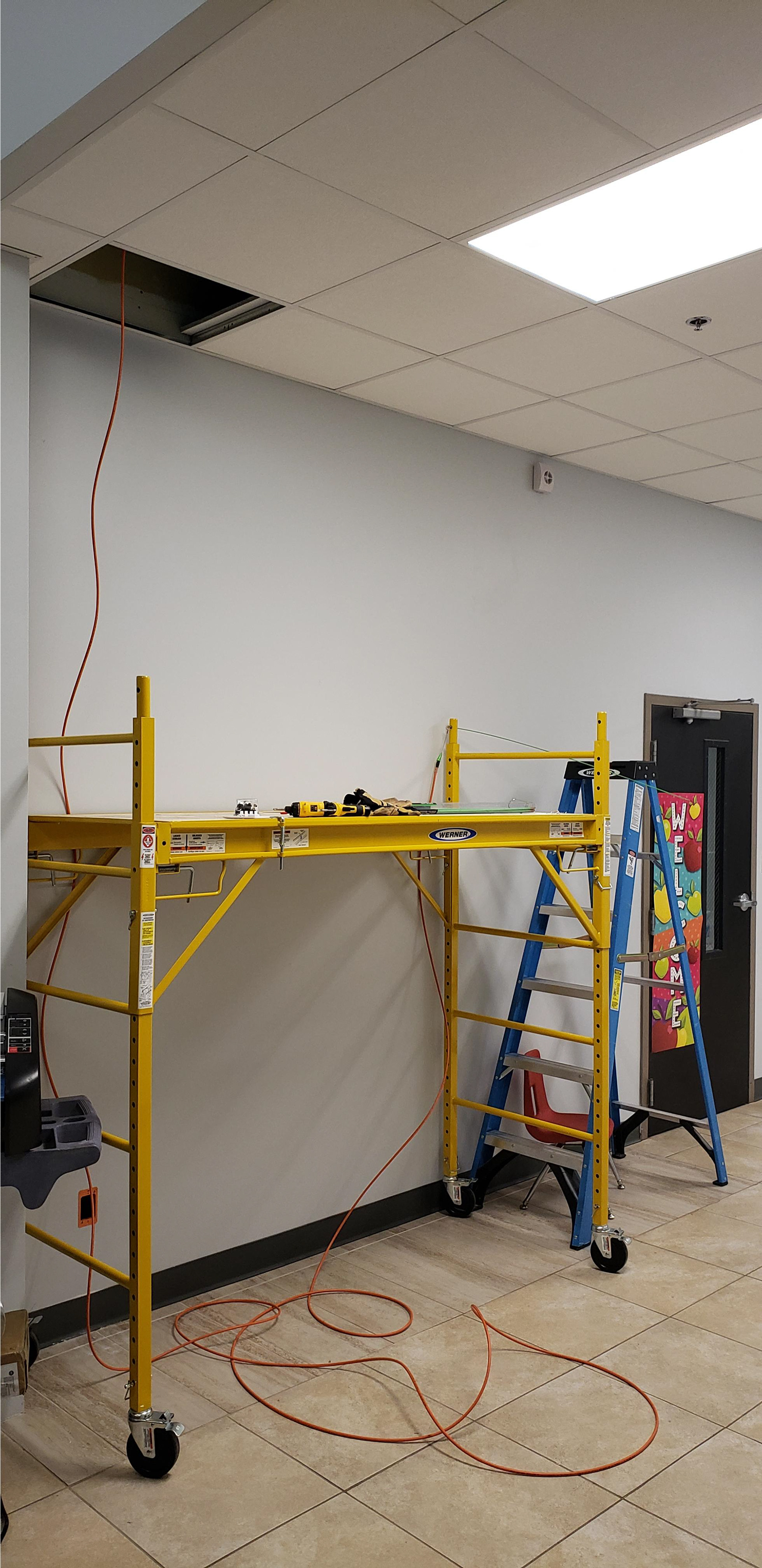 pulling cable to the wall drop