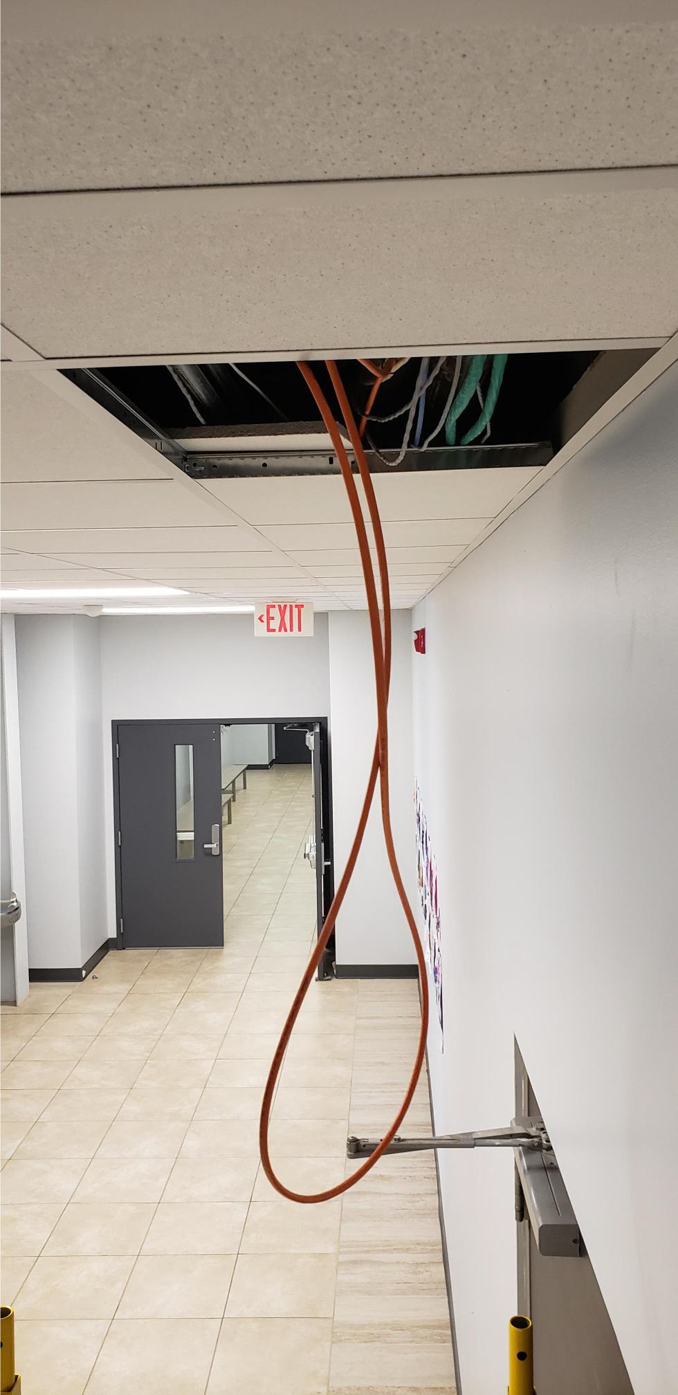 ...and pulling more cable...