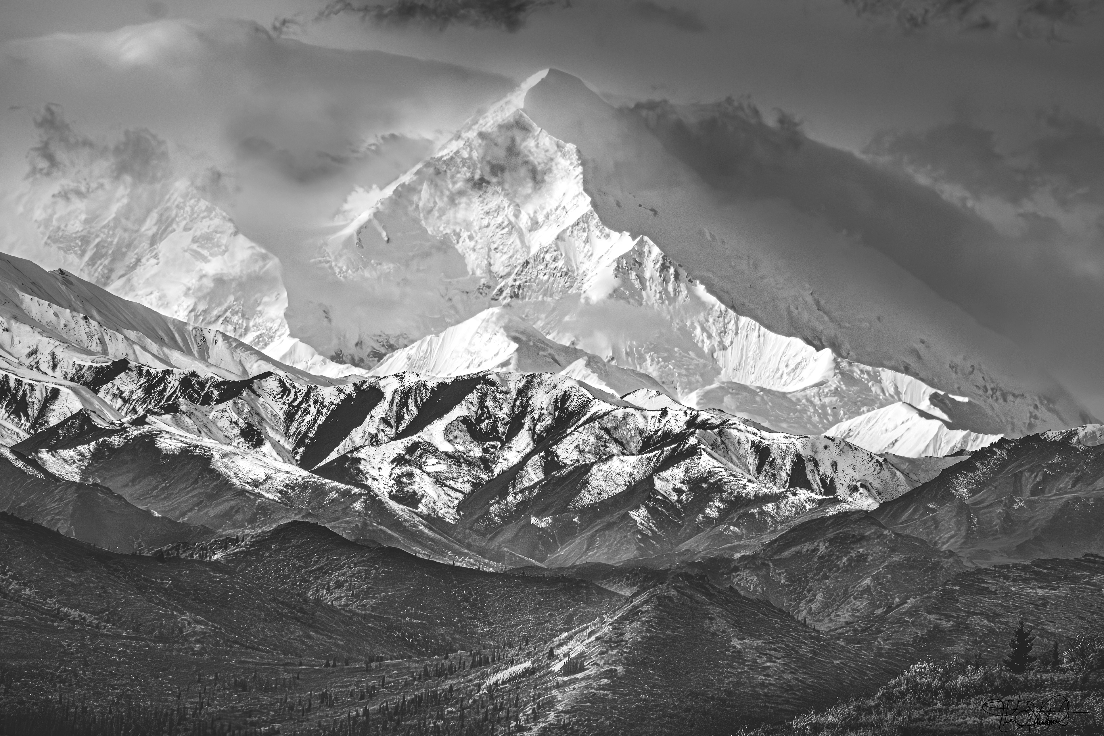Denali peaks through the clouds