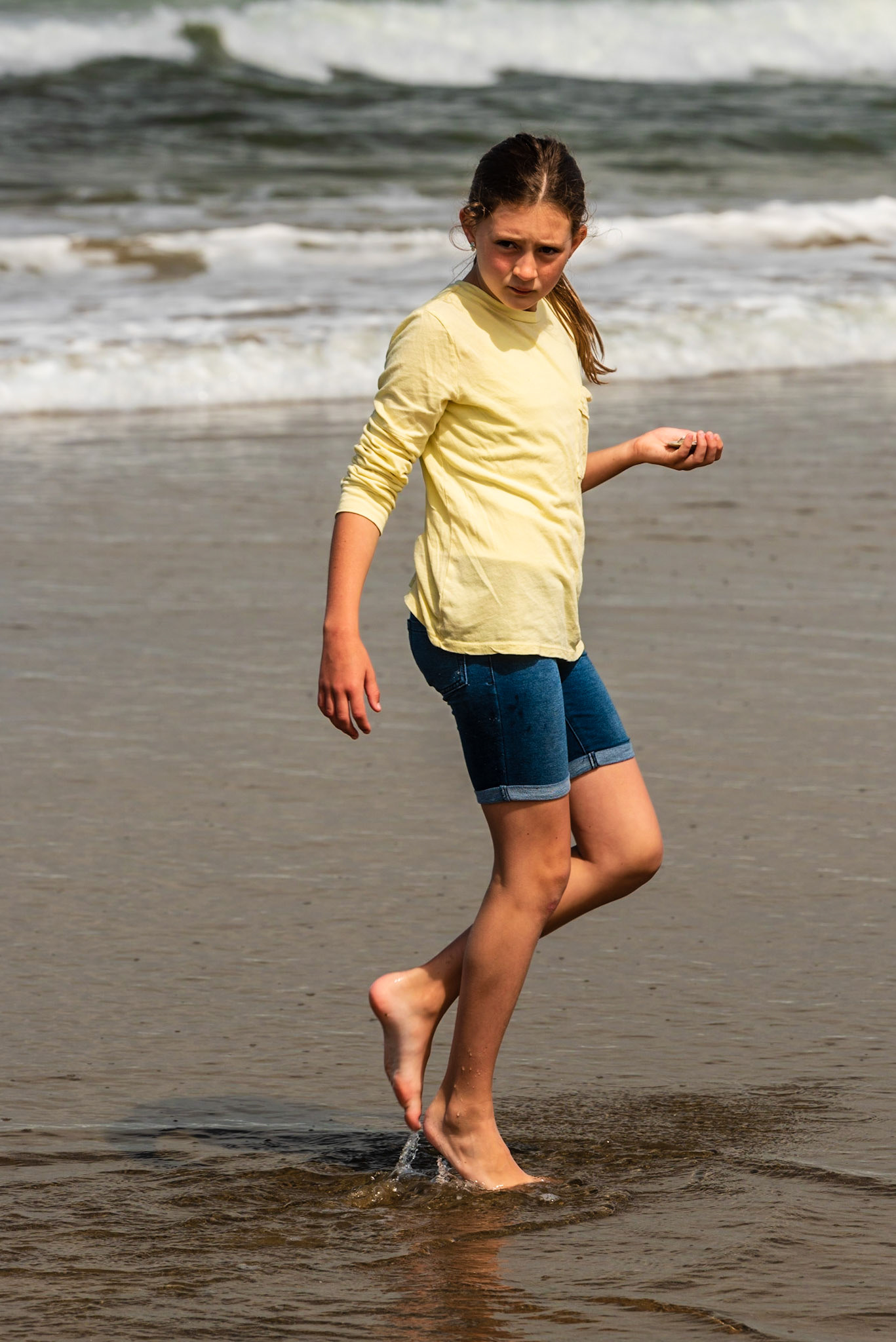 Checking out how others are doing searching for sand dollars at low tide.