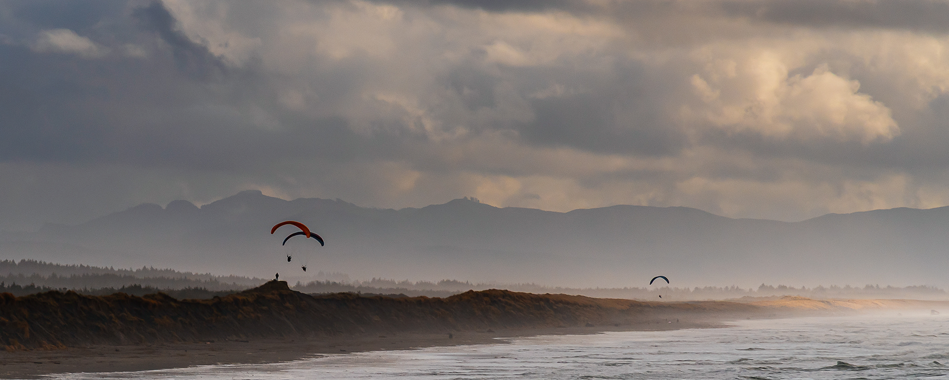 Hang Gliders over the South Jetty