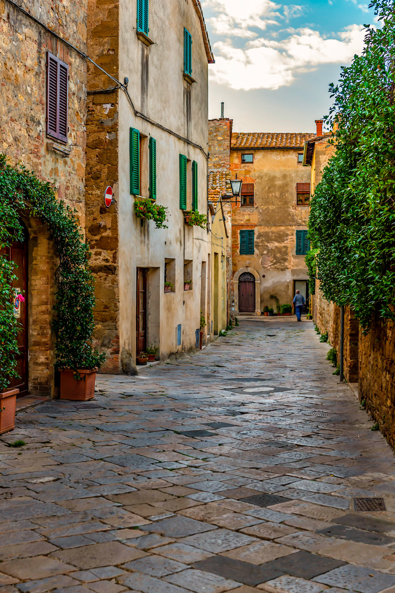 Man walking down neighborhood street