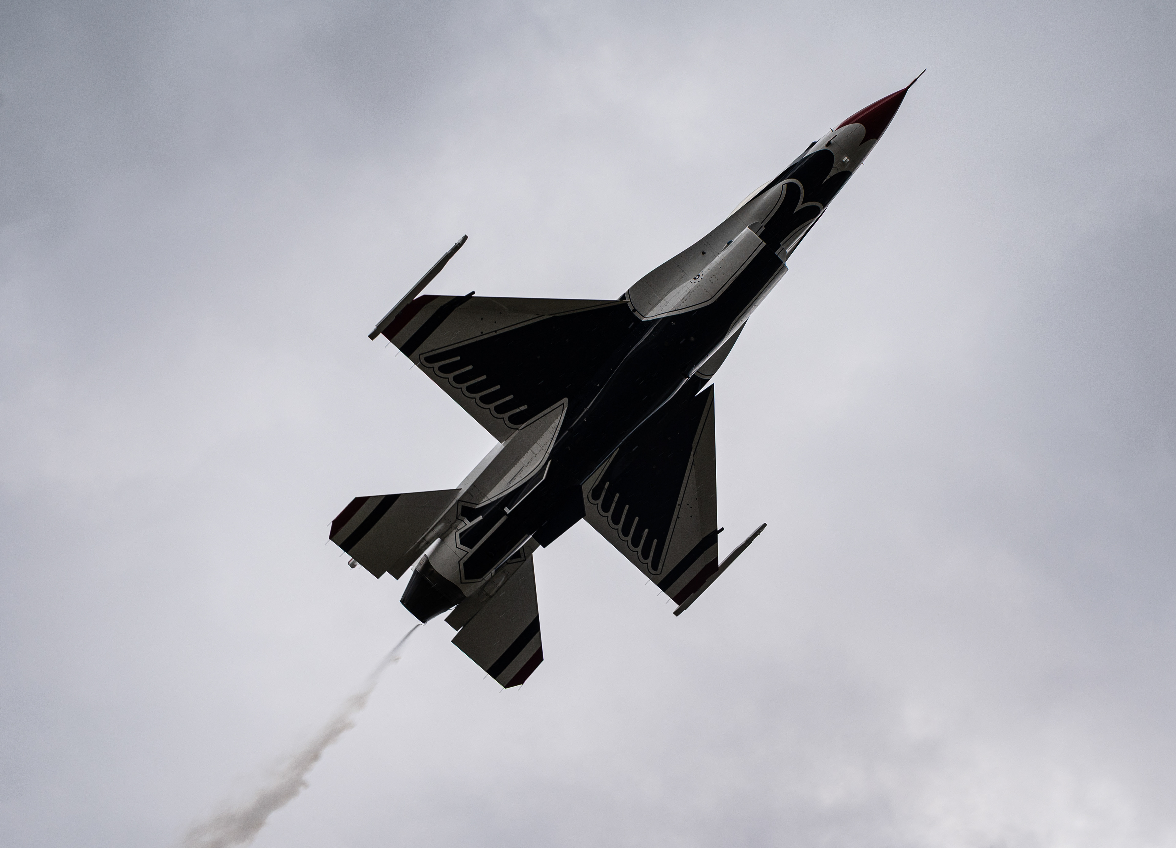 A U.S. Air Force Thunderbird’s F-16 Fighting Falcon performs a maneuver during Wings Over Wayne Open House 2025 at Seymour Johnson Air Force Base, North Carolina, May 4, 2025. The Thunderbirds’ performances supported Air Force recruiting efforts and fostered patriotism by showcasing airpower to the public.