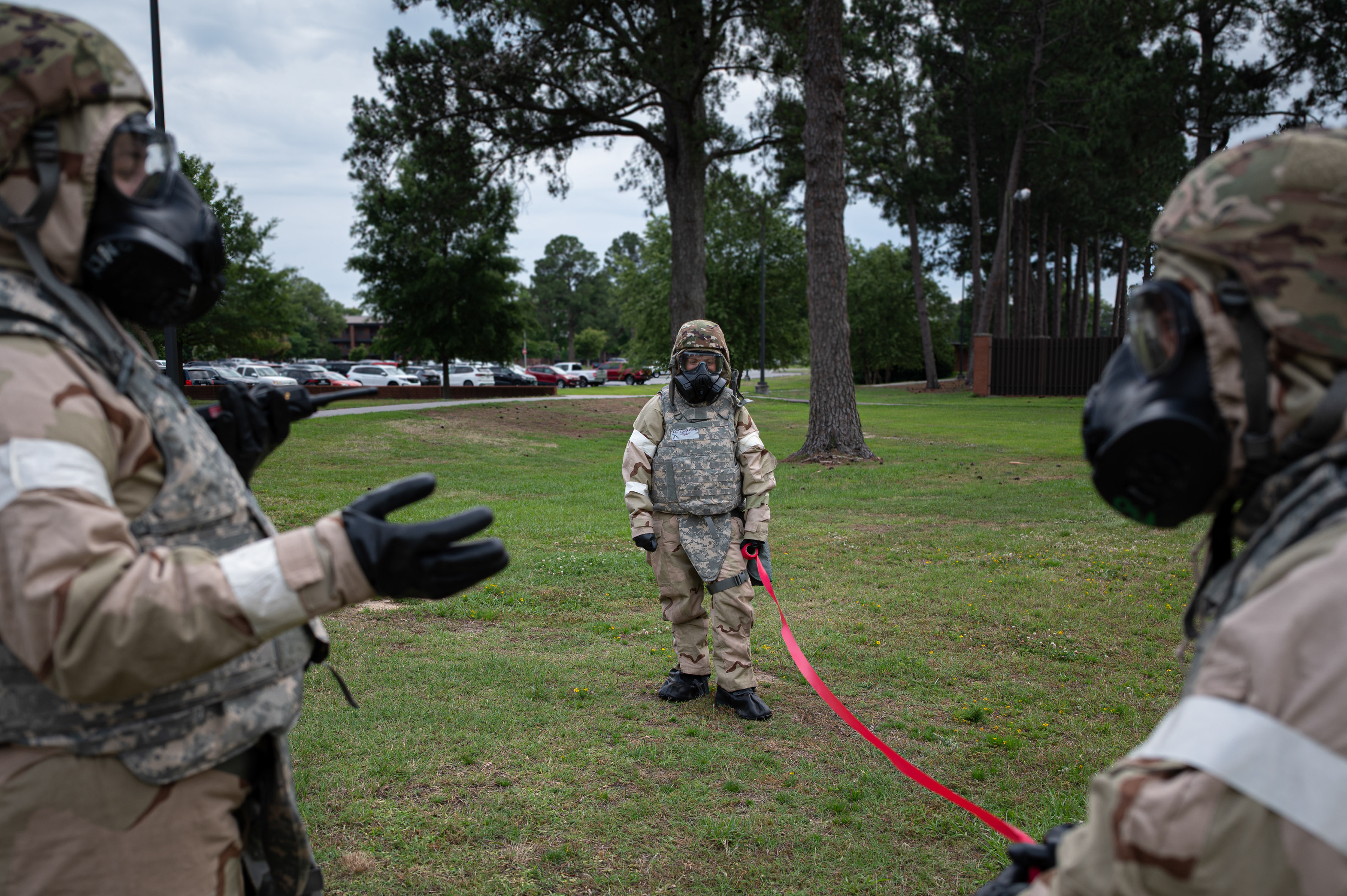 U.S. Air Force Airmen assigned to the 4th Fighter Wing conduct chemical detection procedures during Integrated Contingency Training at Seymour Johnson Air Force Base, North Carolina, May 20, 2025. The training emphasized mission readiness in contested environments by familiarizing personnel with chemical threat identification and protective response protocols.