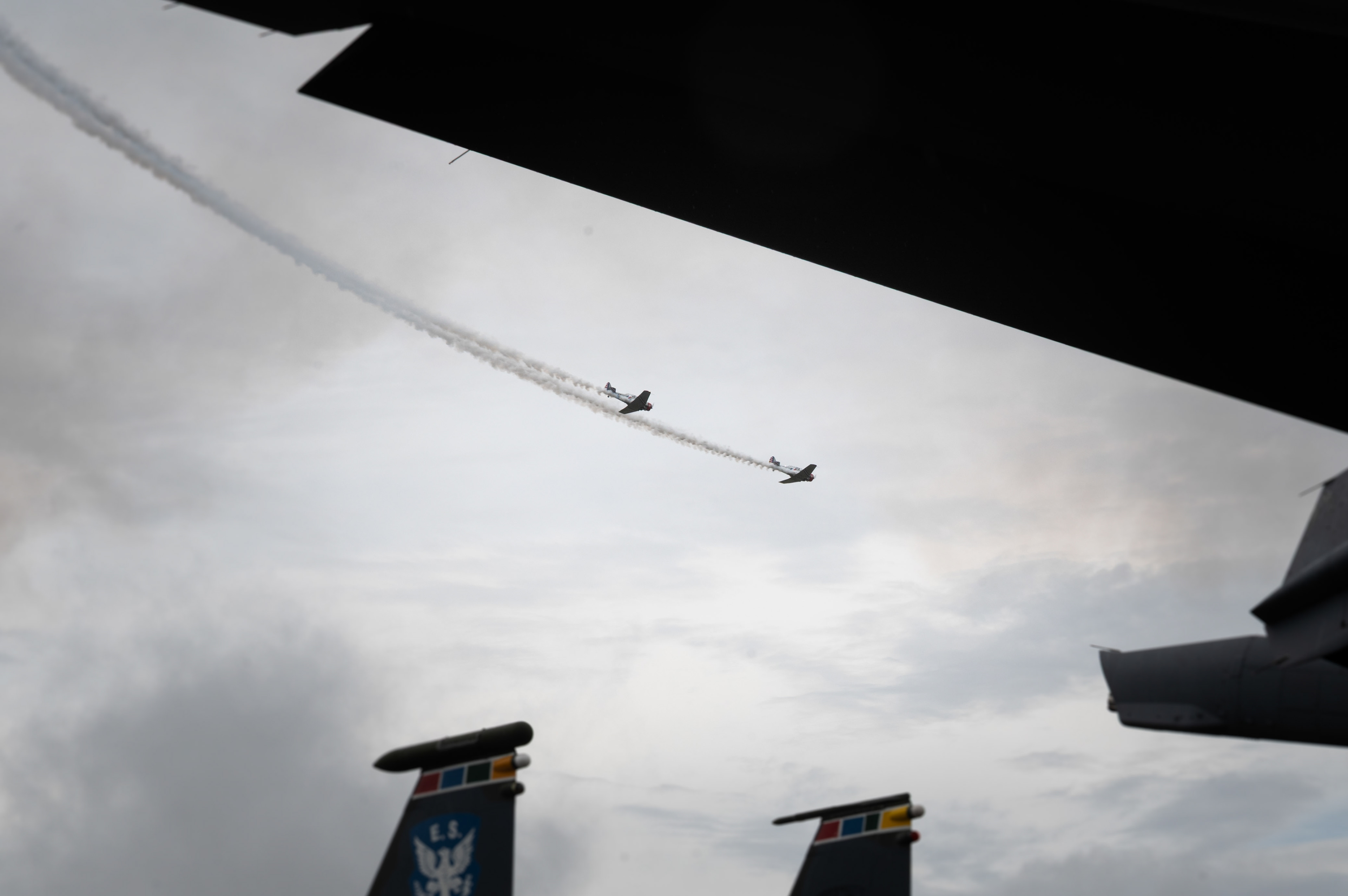 The T-6 Warbird Thunder Aerobatic Demonstration Team performs an aerial demonstration during the Wings Over Wayne Open House 2025 at Seymour Johnson Air Force Base, North Carolina, May 4, 2025. The aerial demonstration thrilled spectators and highlighted the precision and professionalism required to be a pilot.
