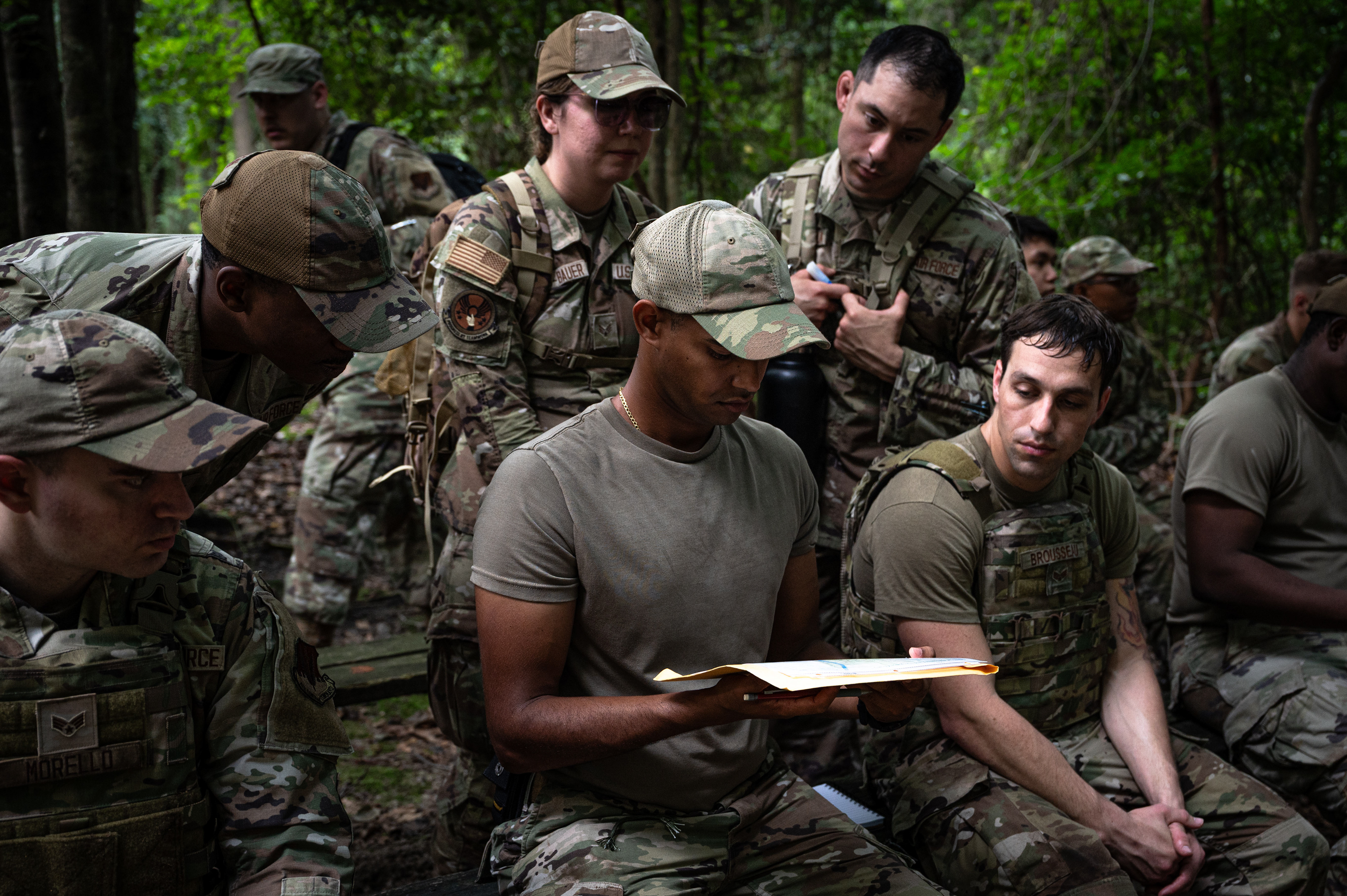 U.S. Air Force Airmen, assigned to the 4th Civil Engineer Squadron, are briefed on land navigation during the Super Prime BEEF exercise at Cliffs of the Neuse State Park, North Carolina, July 17, 2025. Land navigation remains a vital skill for teams operating in austere locations. 
