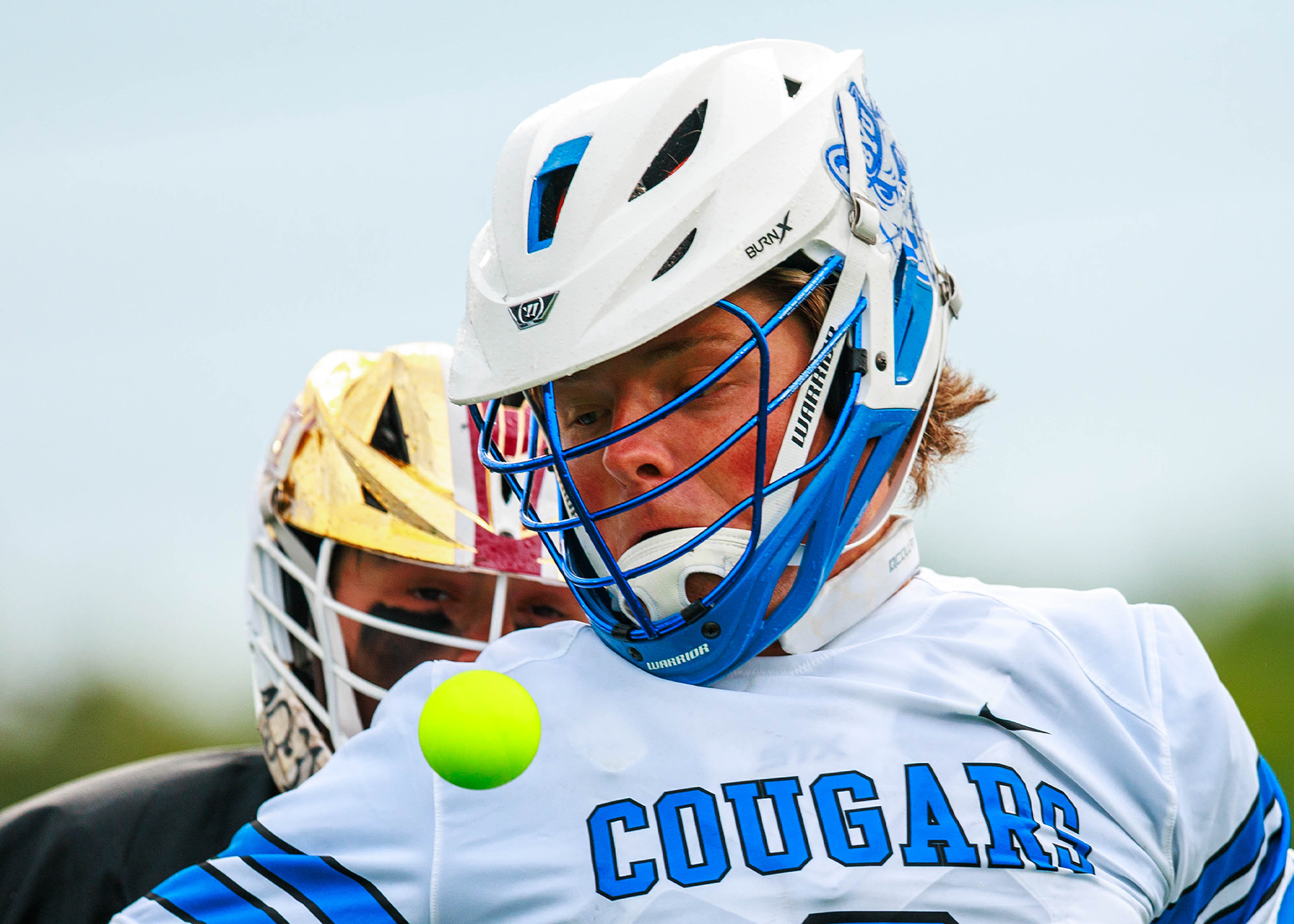 A BYU Cougars player battles for a loose ball against an FSU Seminoles defender during the MCLA National Championship semifinal in Richmond, Virginia. (Photo by Miles Lineberger for The MCLA)