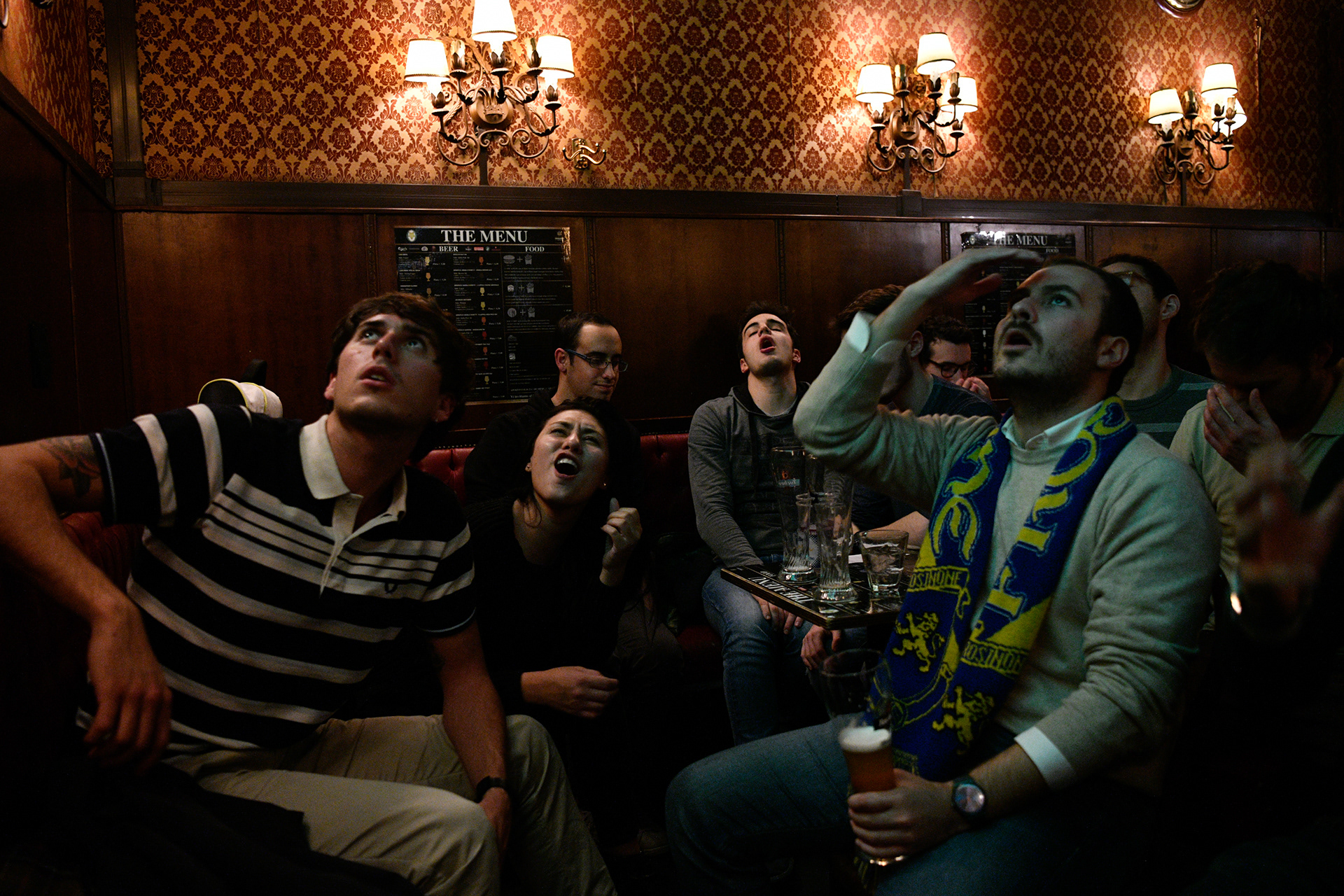 Italy's supporters react at the end of the FIFA World Cup 2018 qualification football match between Italy and Sweden, on November 13, 2017 in a pub of Milan. Piero Cruciatti / AFP