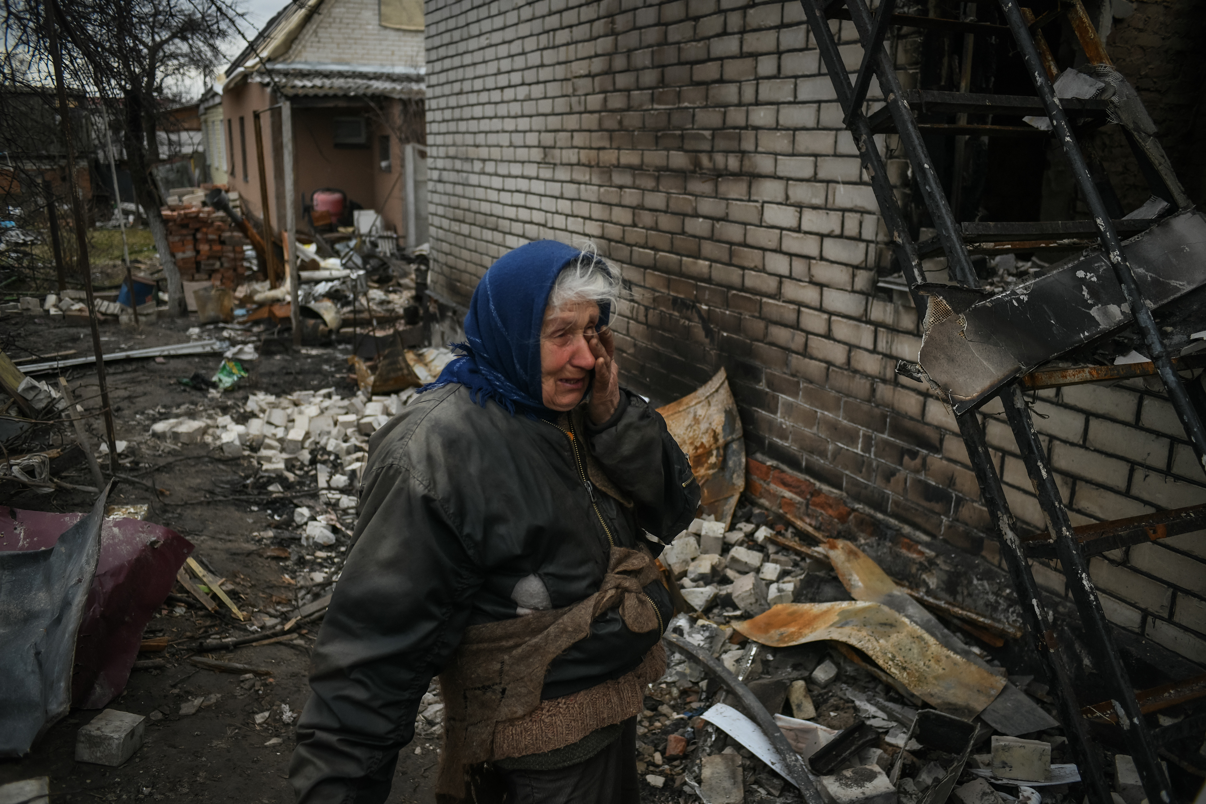 Ganna Petrivna, 76, gestures as she speaks in her house totally destroyed by aviation shellings in a residential area of Chernihiv, Ukraine during the Russian invasion on April 16, 2022.