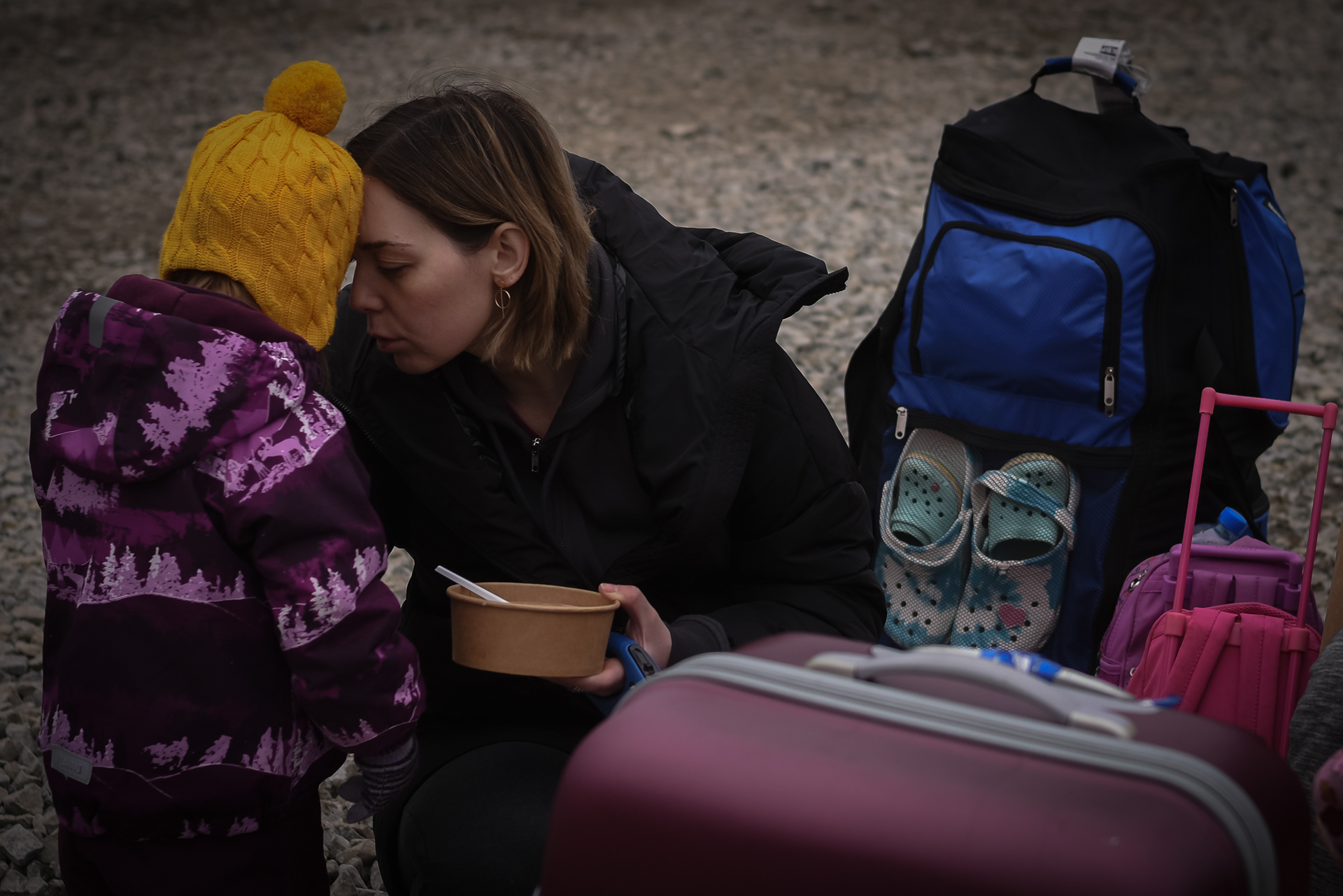 Kroscienko, Poland - March 4, 2022: refugees from Ukraine rest at the border between Poland and Ukraine after Russia launched a full-scale military operation in the country