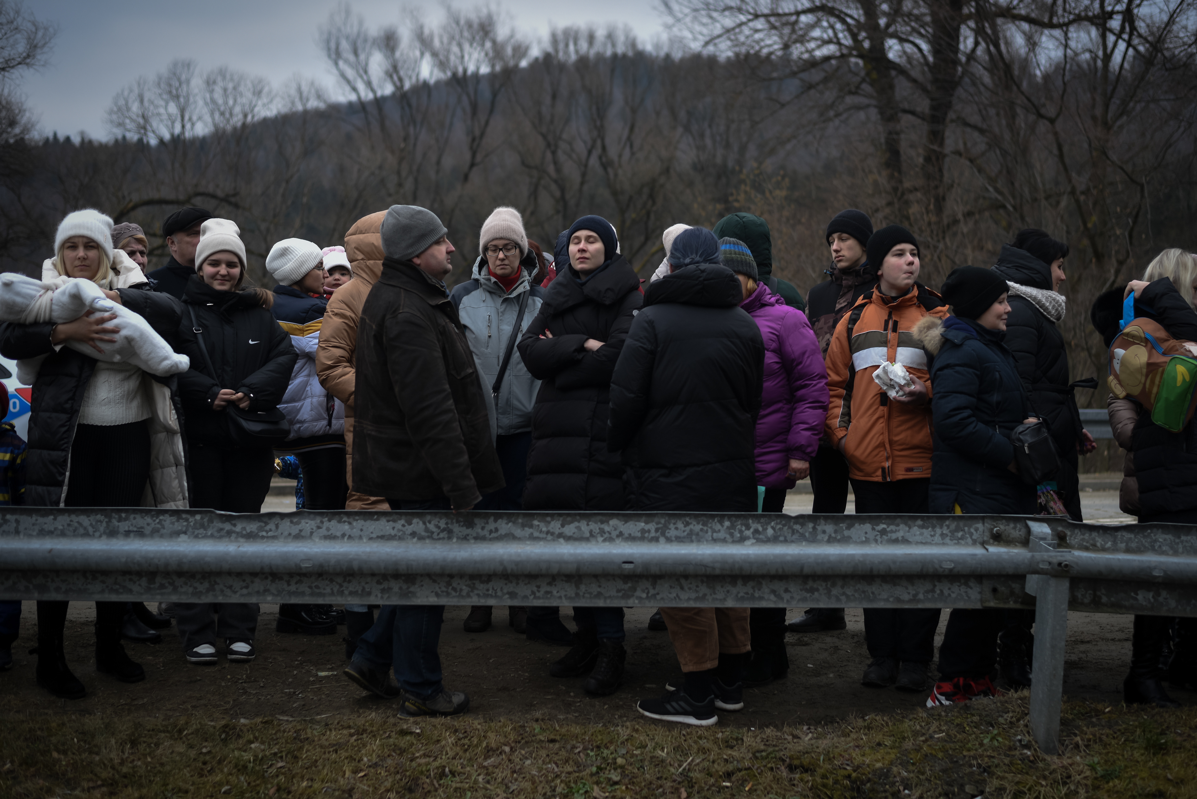 Kroscienko, Poland - March 4, 2022: refugees from Ukraine are seen at the border between Poland and Ukraine after Russia launched a full-scale military operation in the country
