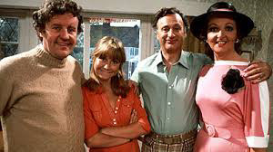 The characters of Tom, Barbara, Gerry and Mango smiiling in poased shot